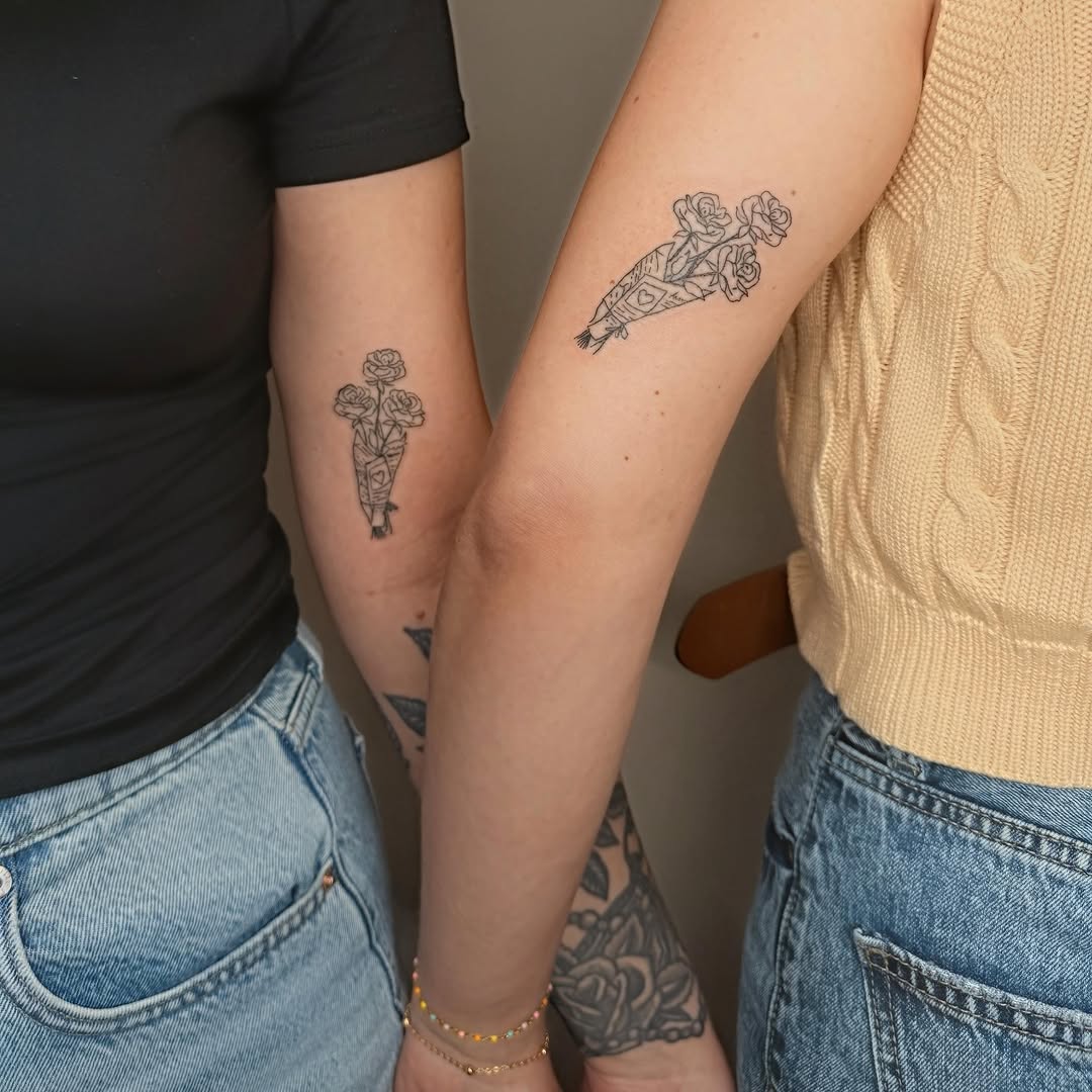 Roses black and grey tattoo on the forearm by Ashlee Burkey