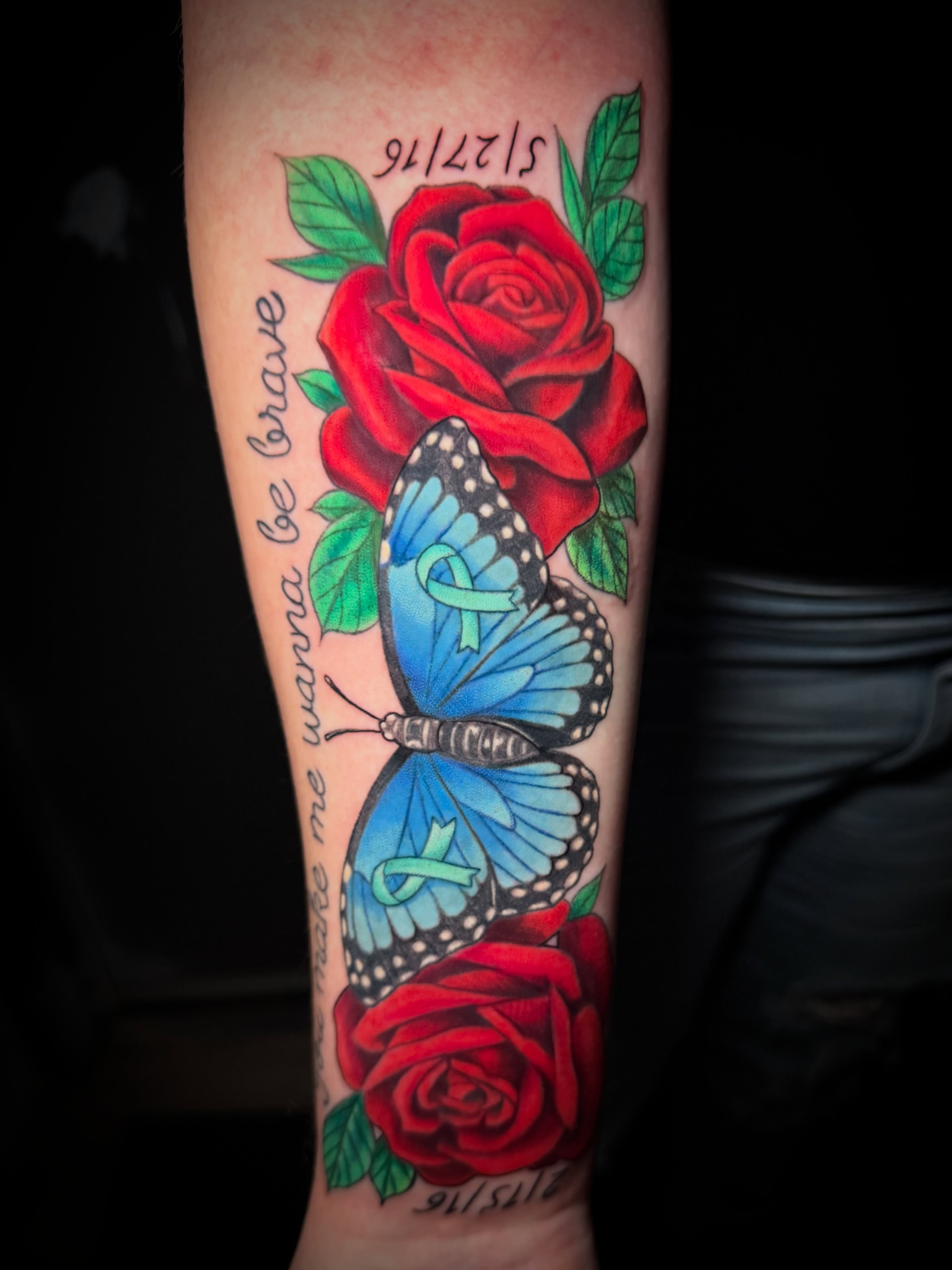 Rose and butterfly American traditional tattoo on the forearm by Tyler Jewett