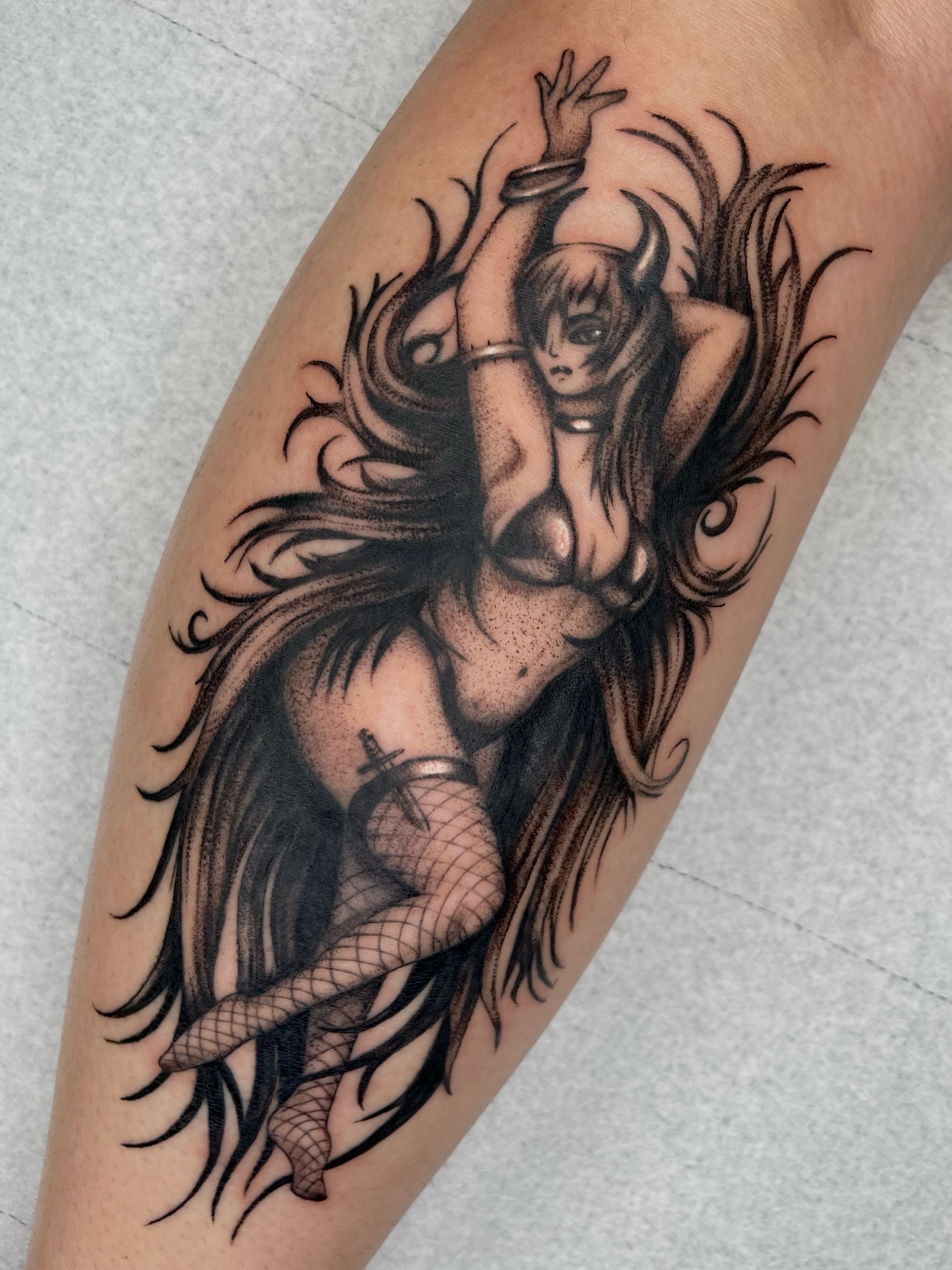 Demon woman realism tattoo on the forearm by Vash
