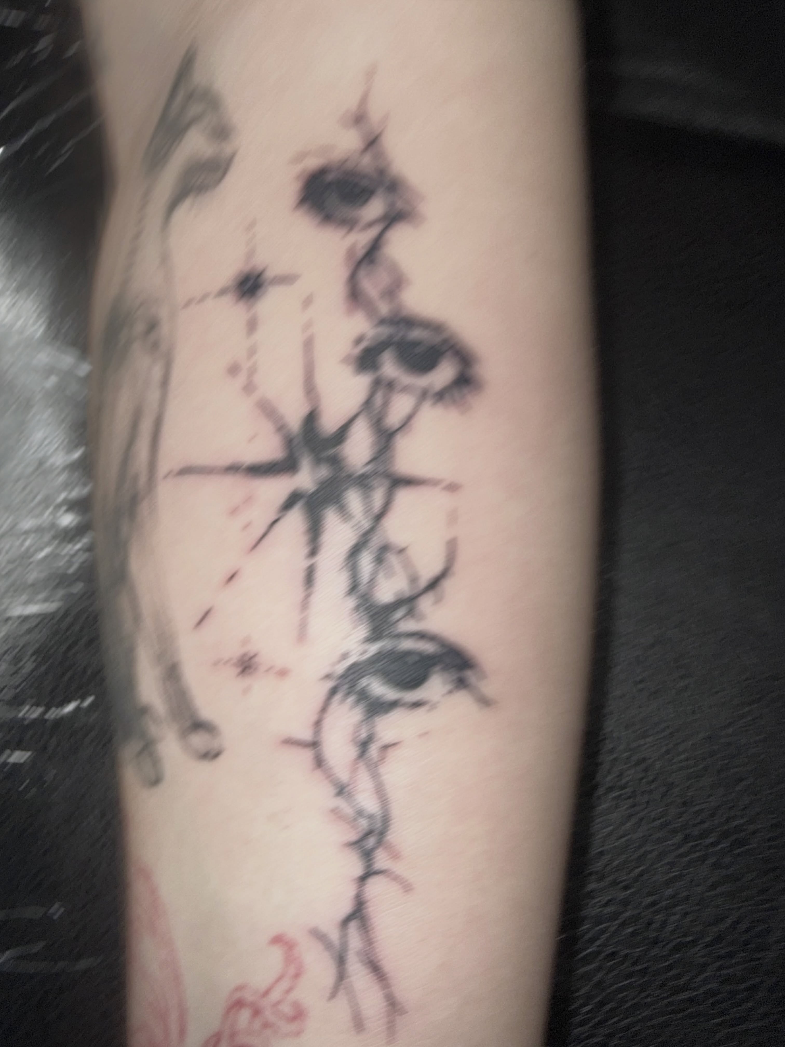 Abstract design dotwork tattoo on the forearm by Jordan Sandoval