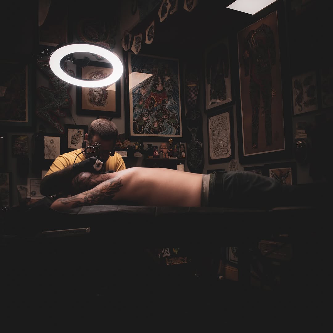 Flame American traditional tattoo on the chest by Leif Hansen