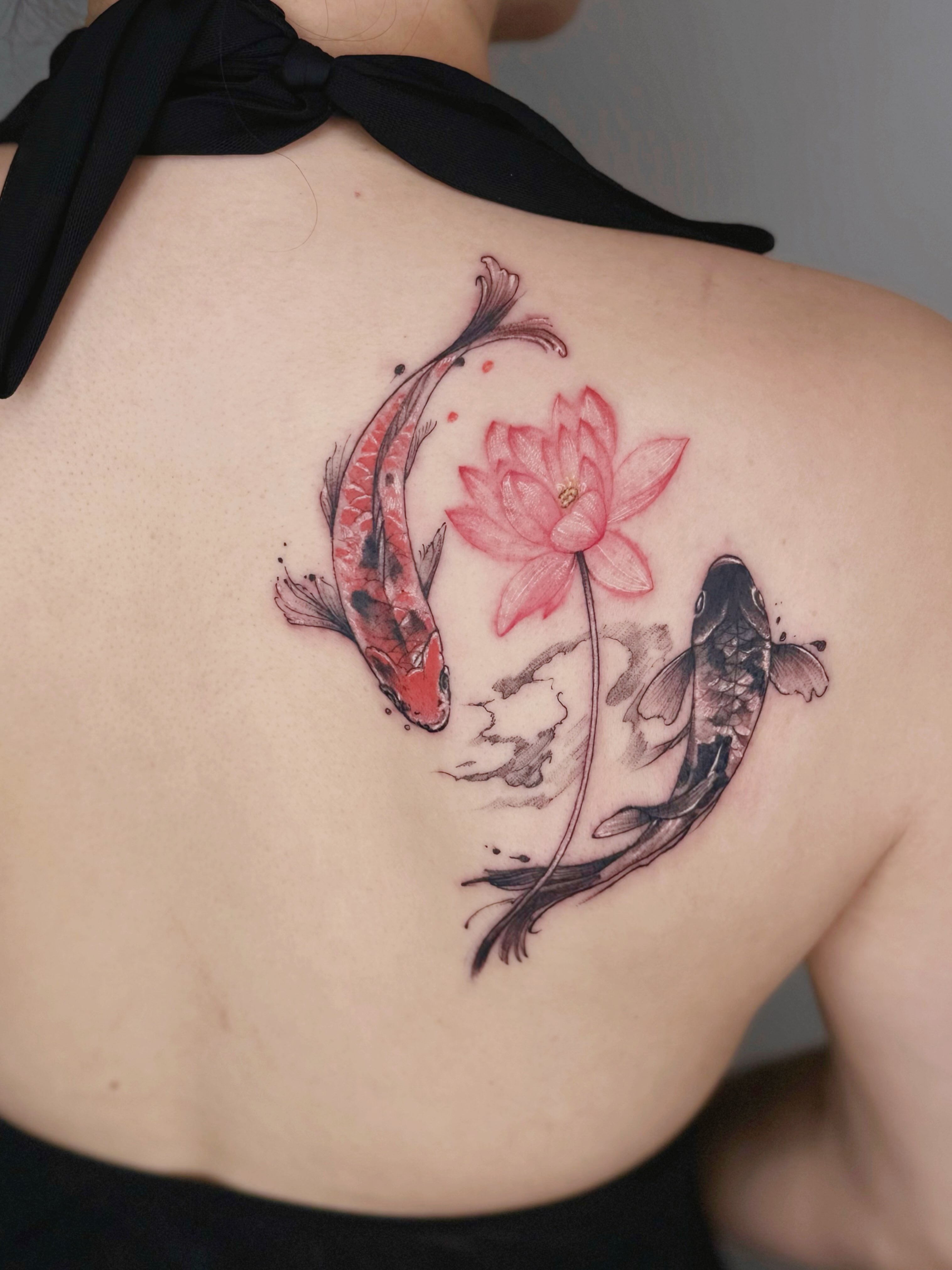 Koi fish and lotus watercolor tattoo on the back by ๐๐๐๐ ๐๐๐๐๐๐ ๐๐๐๐๐