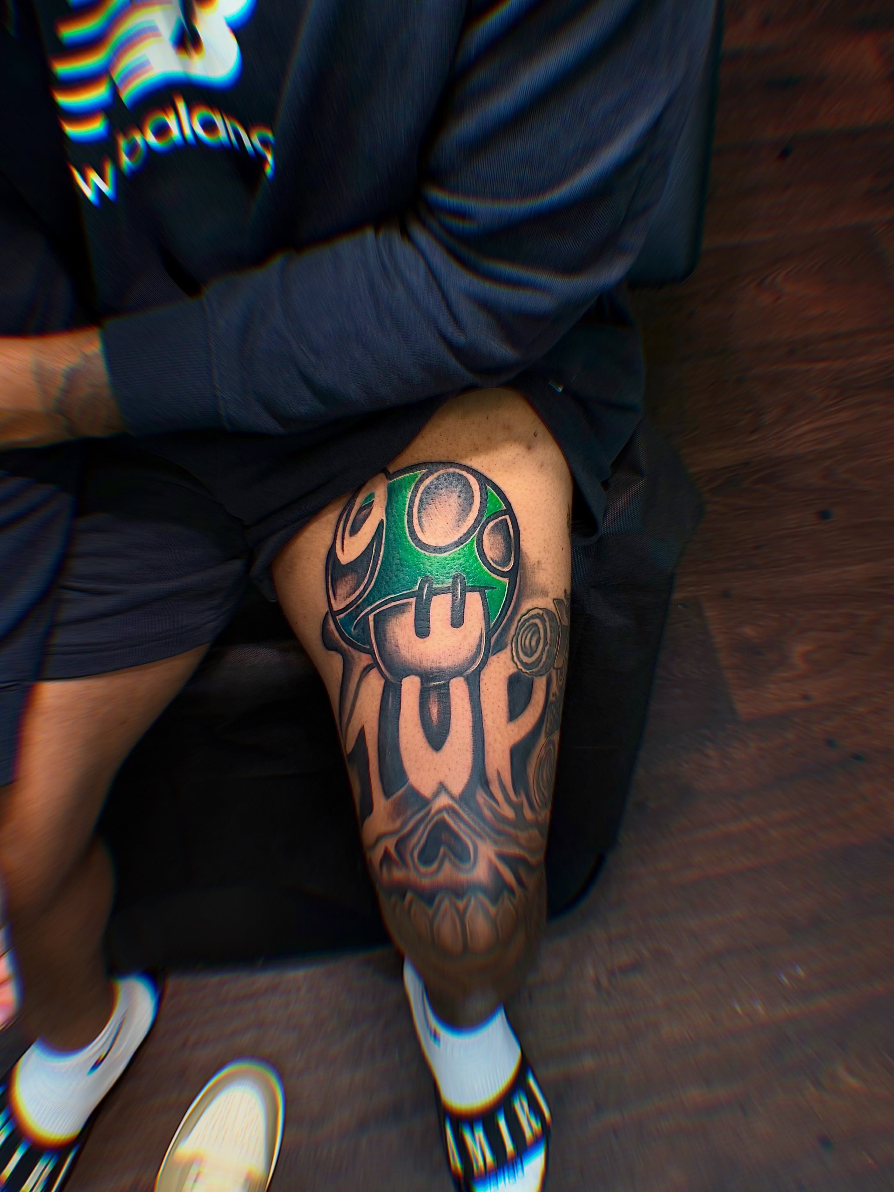 Mushroom dotwork tattoo on the thigh by Deonte Dwayne Durham