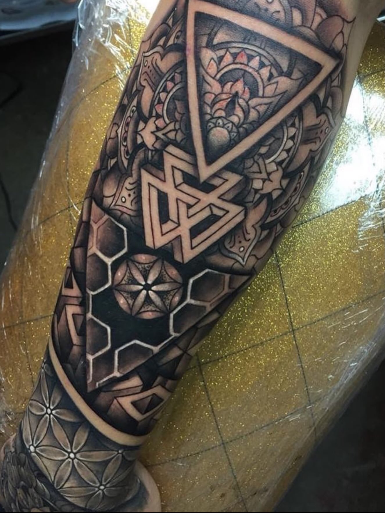 Geometric mandala geometric tattoo on the forearm by Cuda