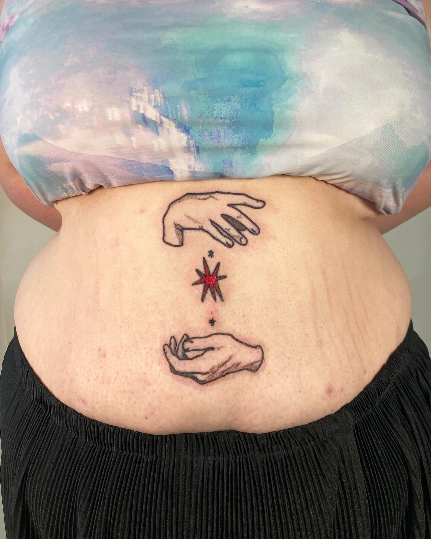 Hands and star dotwork tattoo on the torso by james <3