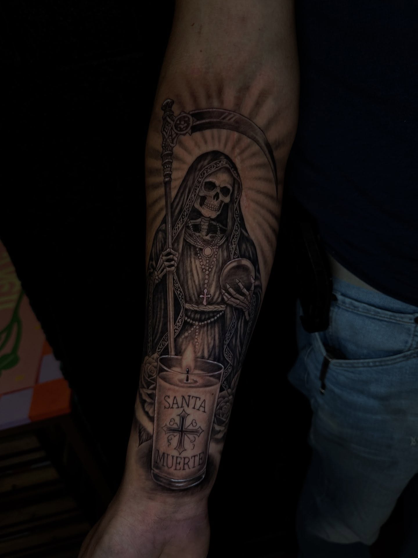 Santa Muerte realism tattoo on the forearm by Mario Flores Tattoo