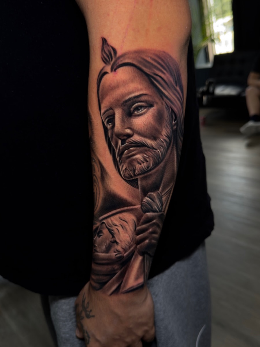 Religious figure realism tattoo on the forearm by Dallas tattoo artist, Dallas, Texas