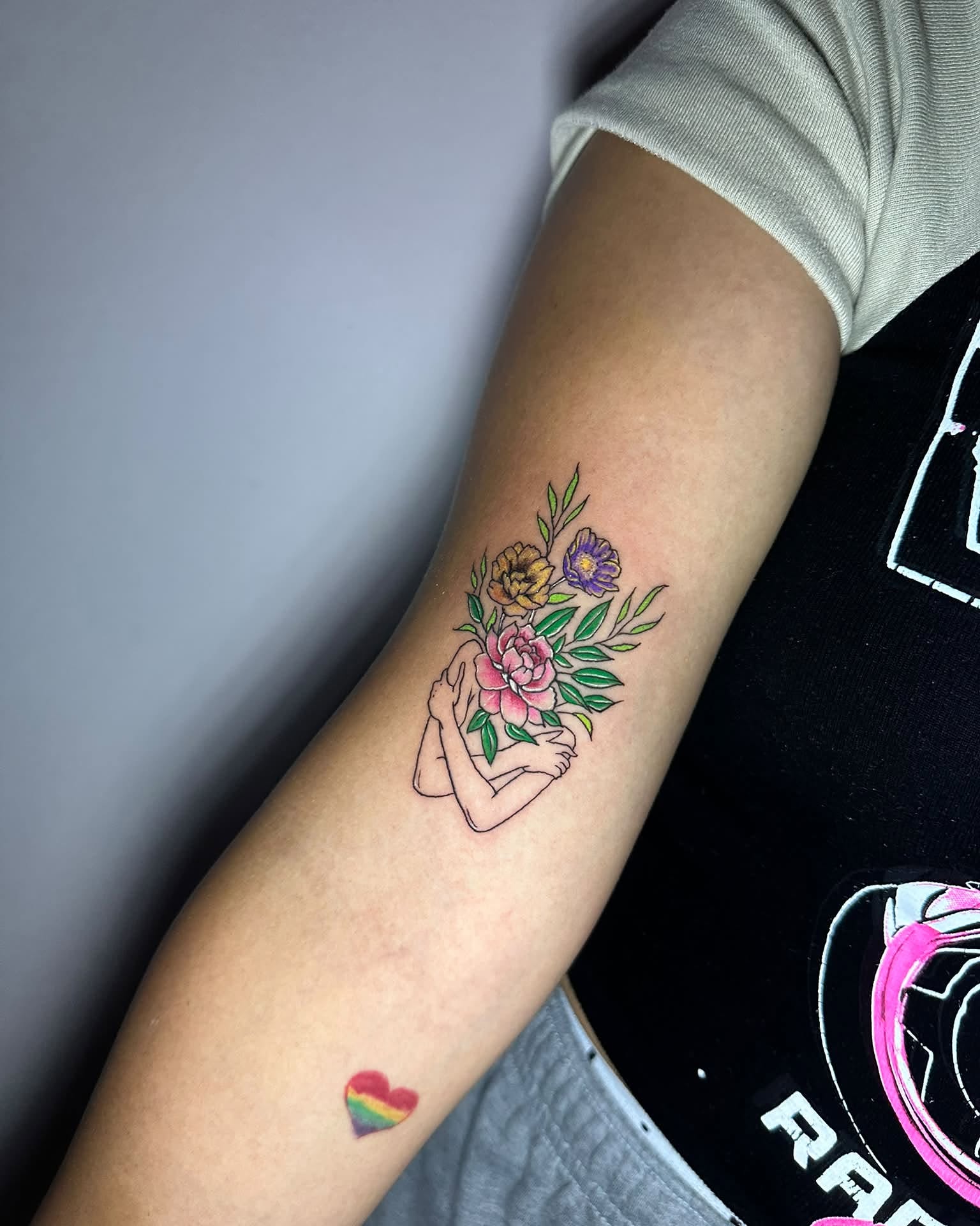 Floral bouquet new school tattoo on the forearm by Stephen Degracia