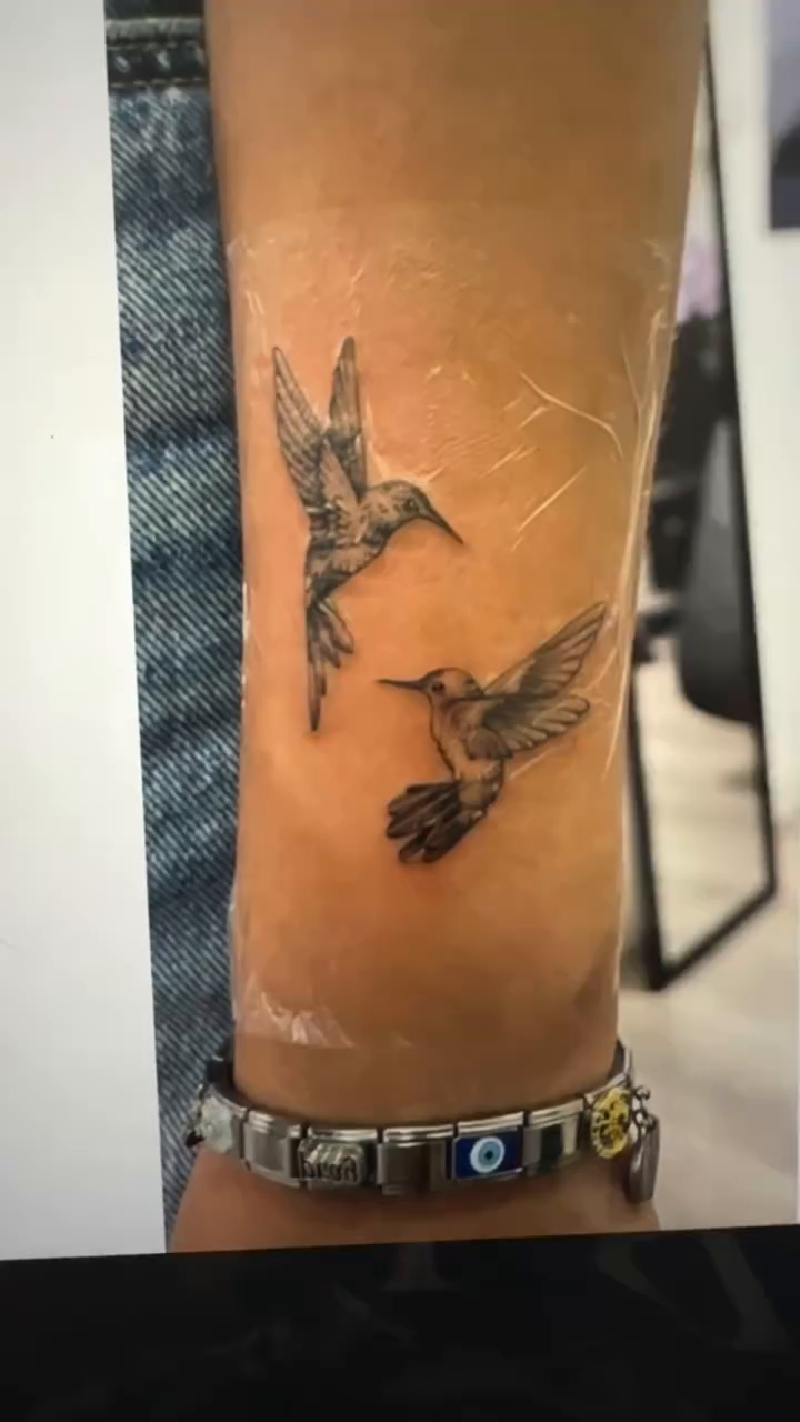 Hummingbirds fine line tattoo on the forearm by Cherry🥀