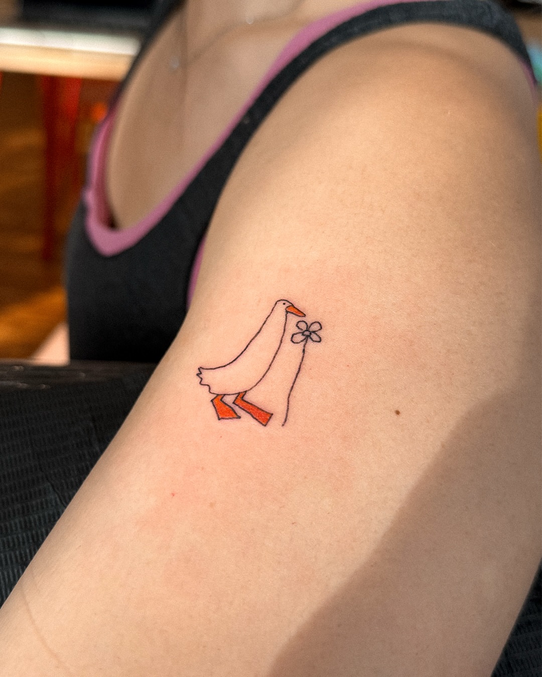 Ducks minimalist tattoo on the forearm by Eden Kalif