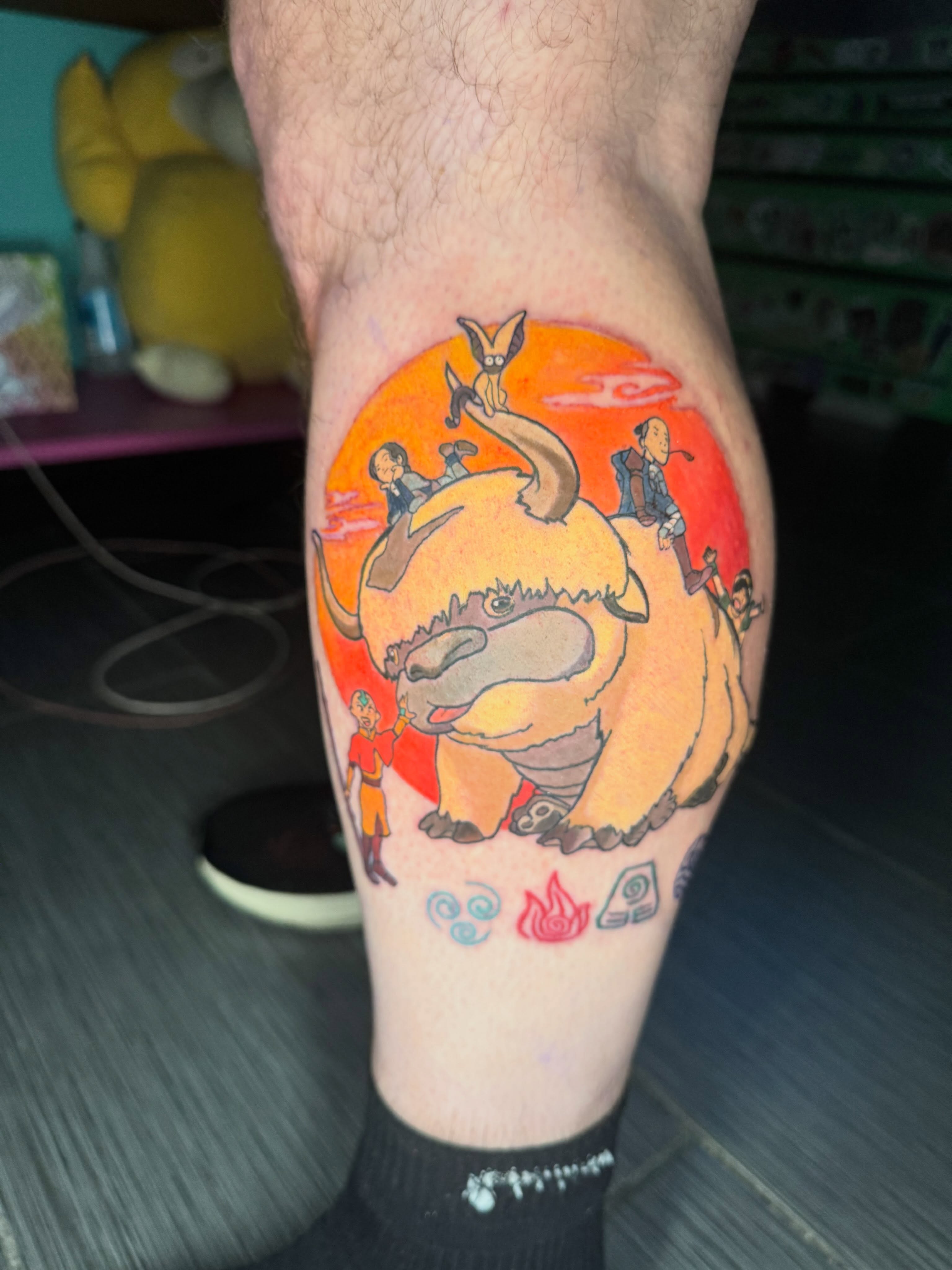 Avatar: The Last Airbender characters anime tattoo on the thigh by Paula.p.tattoos
