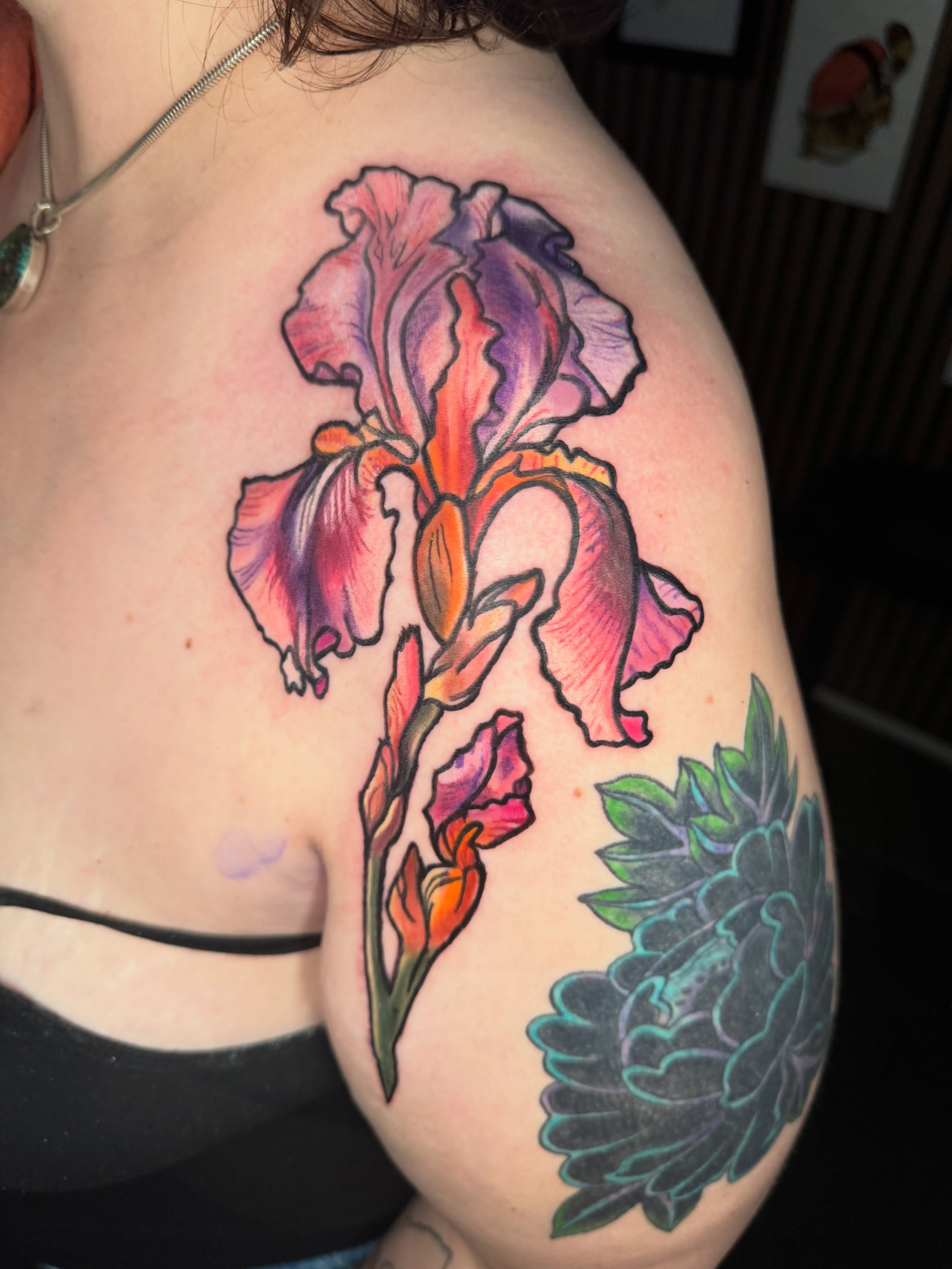 Iris watercolor tattoo on the shoulder by Paula.p.tattoos