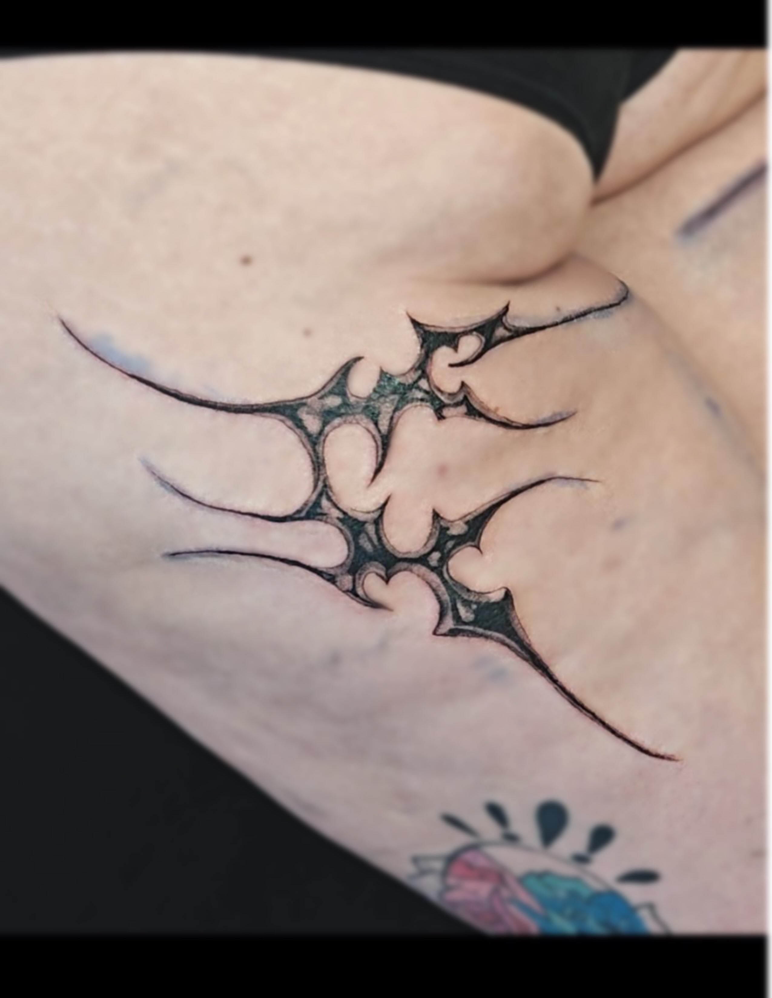 Abstract geometric pattern geometric tattoo on the ribs by Sebastiana