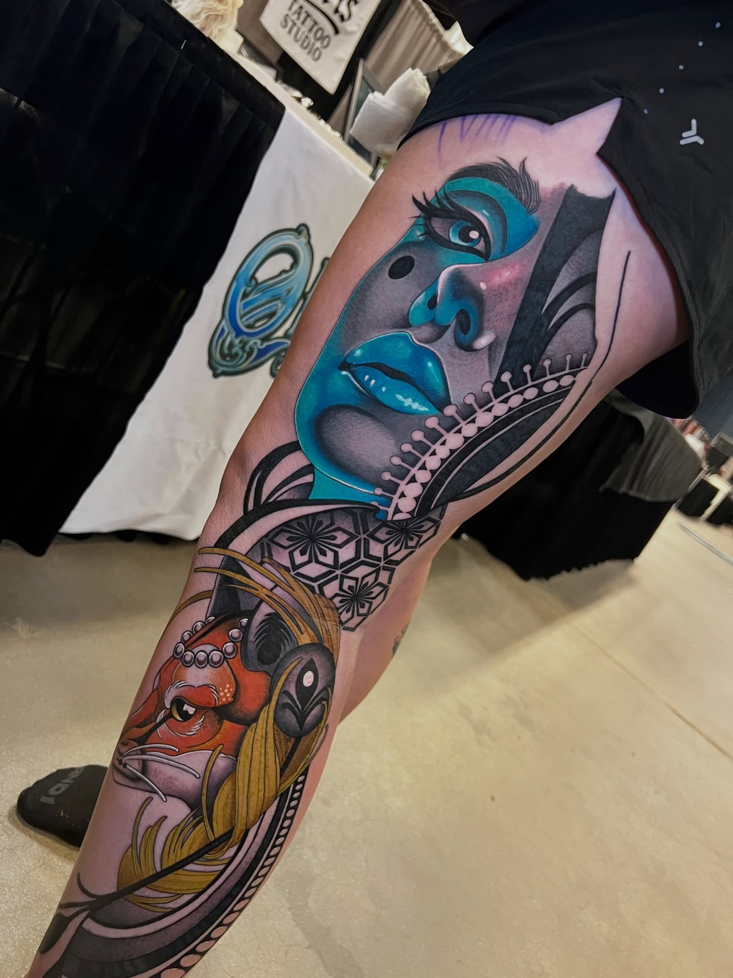 Mask and woman japanese irezumi tattoo on the thigh by Tattoo Artist