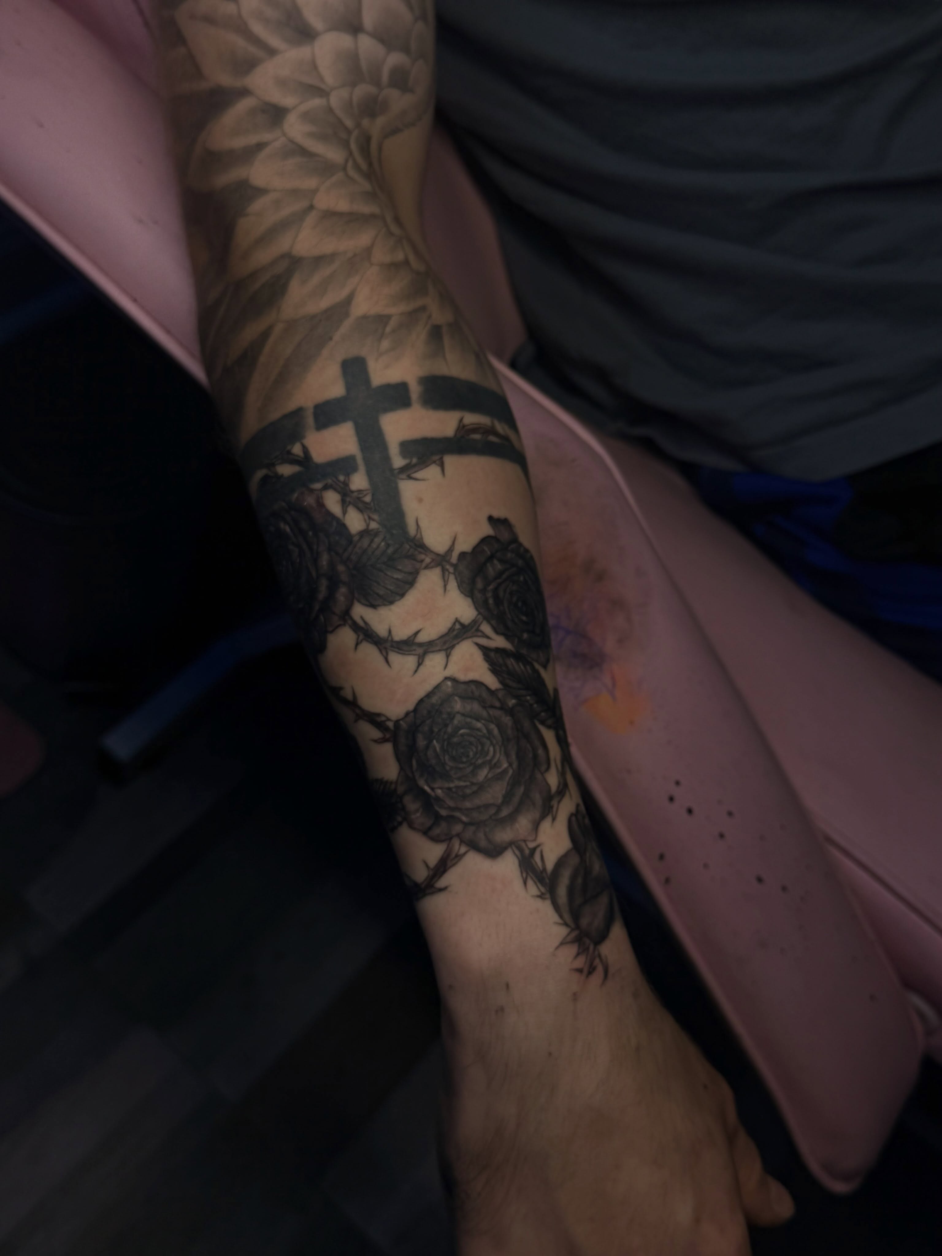 Roses and thorns black and grey tattoo on the forearm by Tattoos by Santos