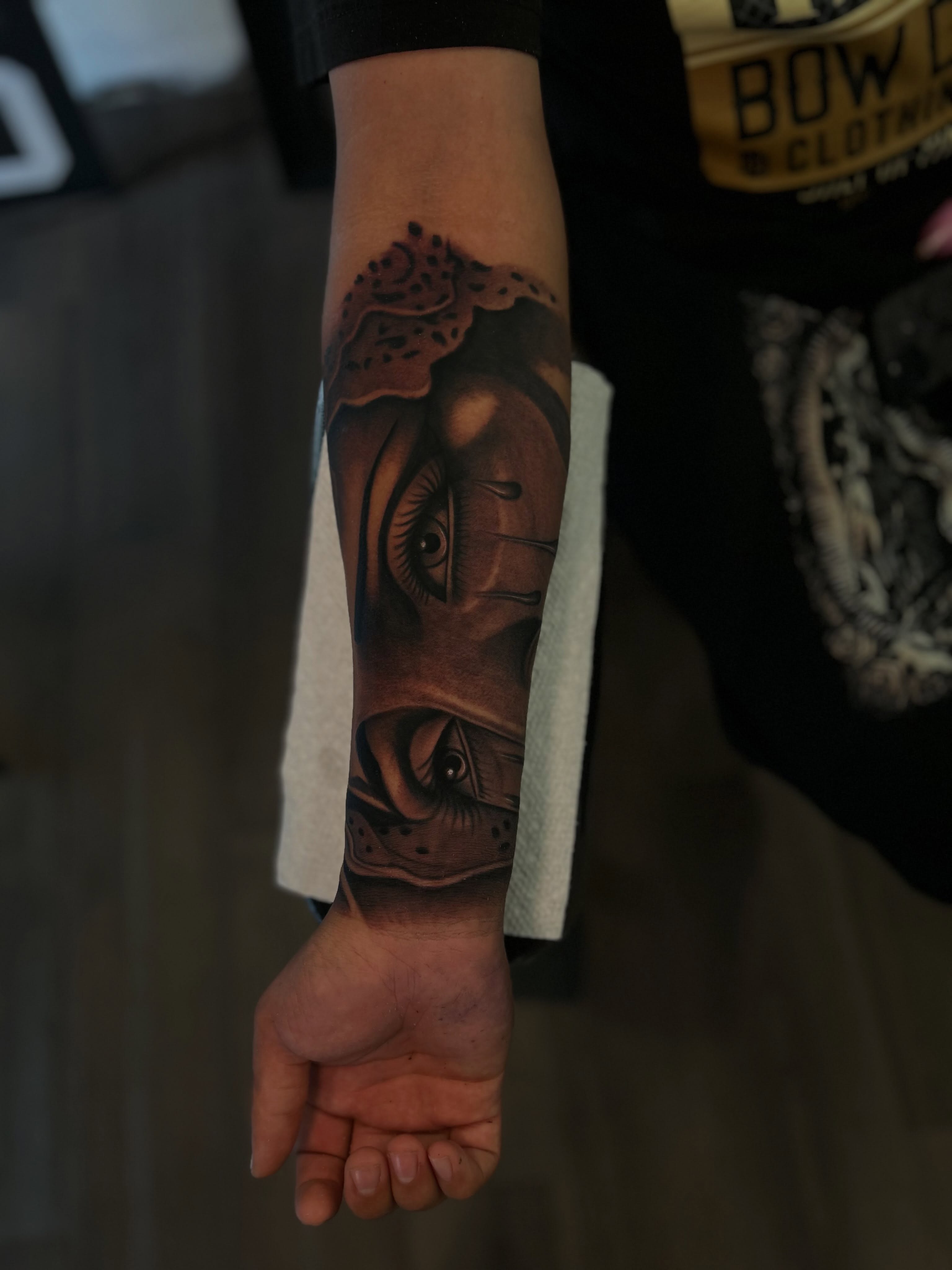 Eyes realism tattoo on the forearm by Tattoo Artist