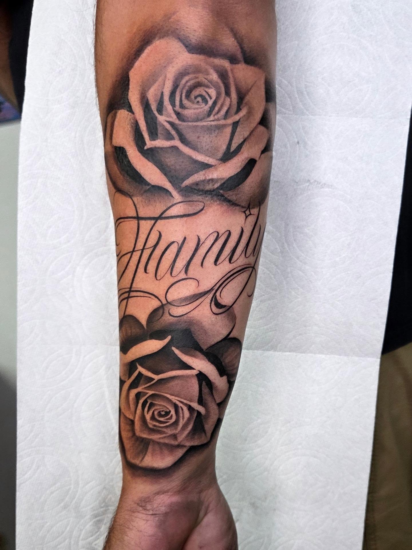 Rose realism tattoo on the forearm by Yvette Cebreros