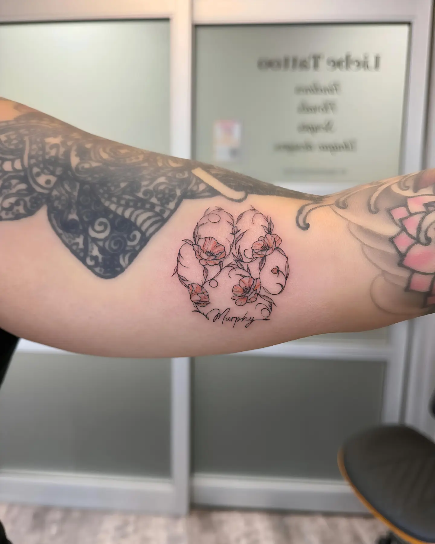 Cherry blossoms dotwork tattoo on the forearm by Floral Fineline Tattoo