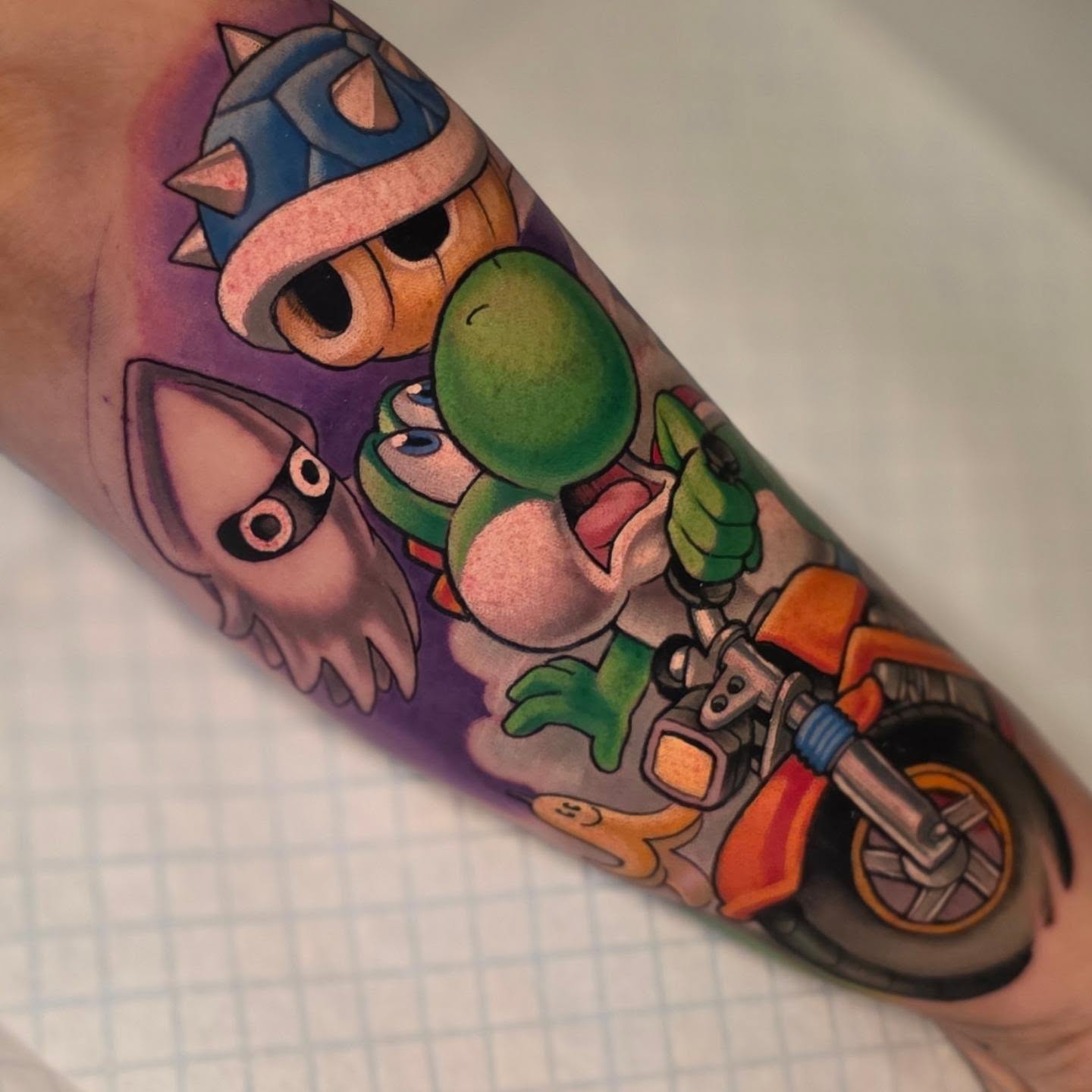 Yoshi motorcycle new school tattoo on the forearm by coryhandtattoos, Maryville, Tennessee