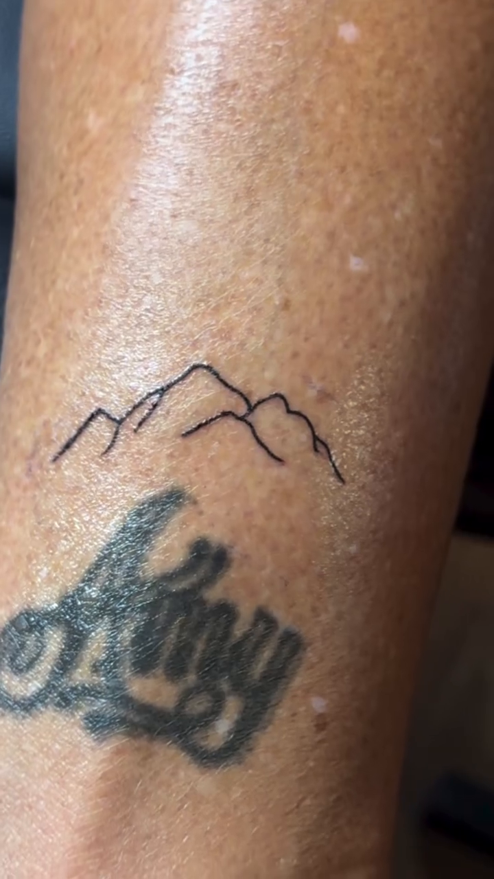 Mountains and text fine line tattoo by 𝕽𝖆𝖈𝖍𝖊𝖑 𝕽𝖆𝖉𝖎𝖈𝖆𝖑 Queens Tattooer