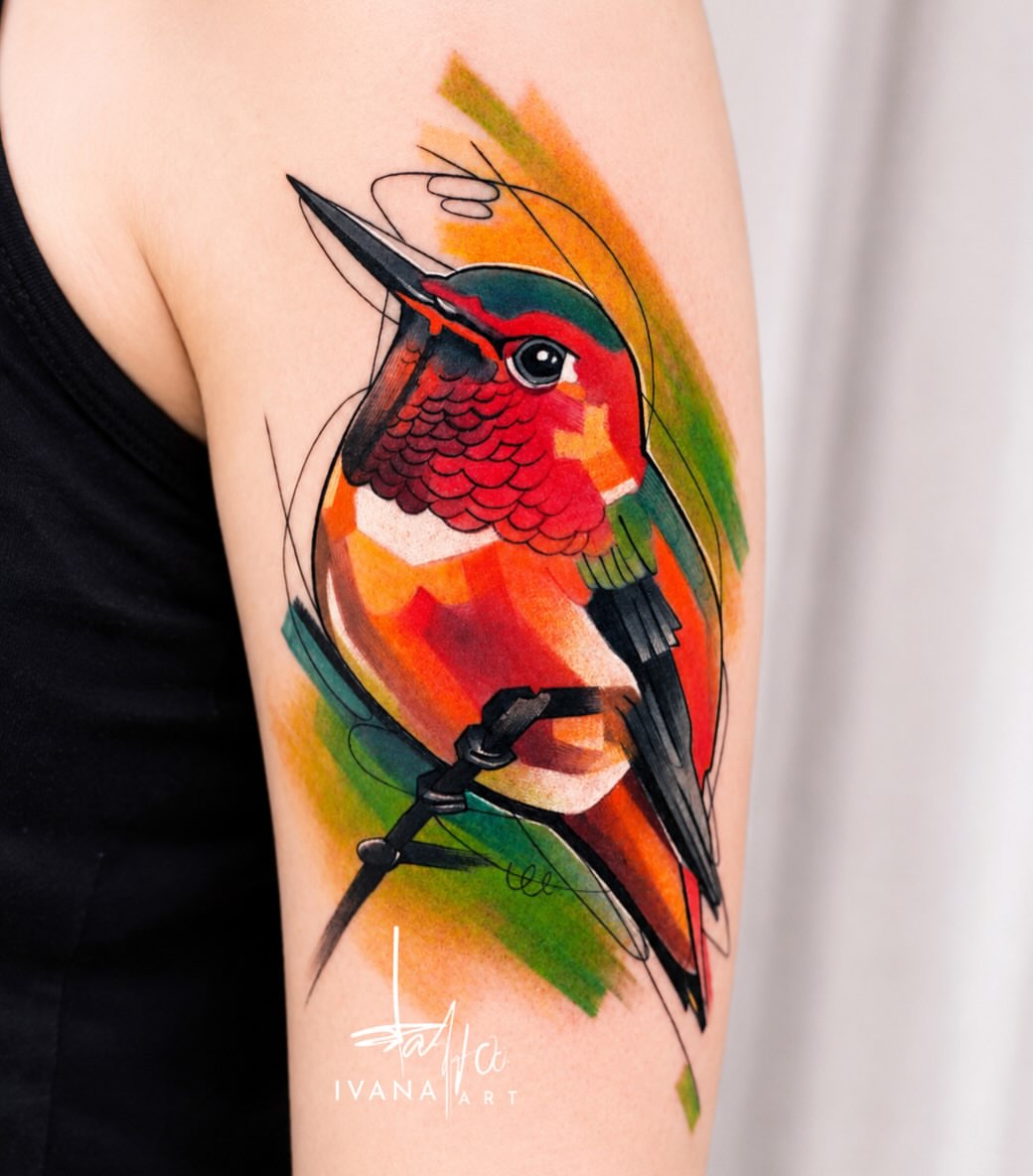 Hummingbird watercolor tattoo on the forearm by Ivana Belakova