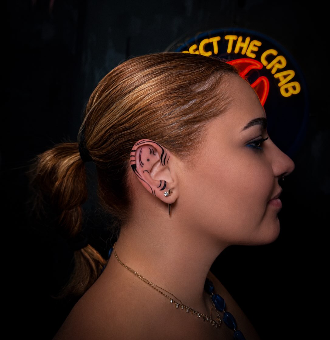 Ear American traditional tattoo by Keyla Valdes, Miami, Florida