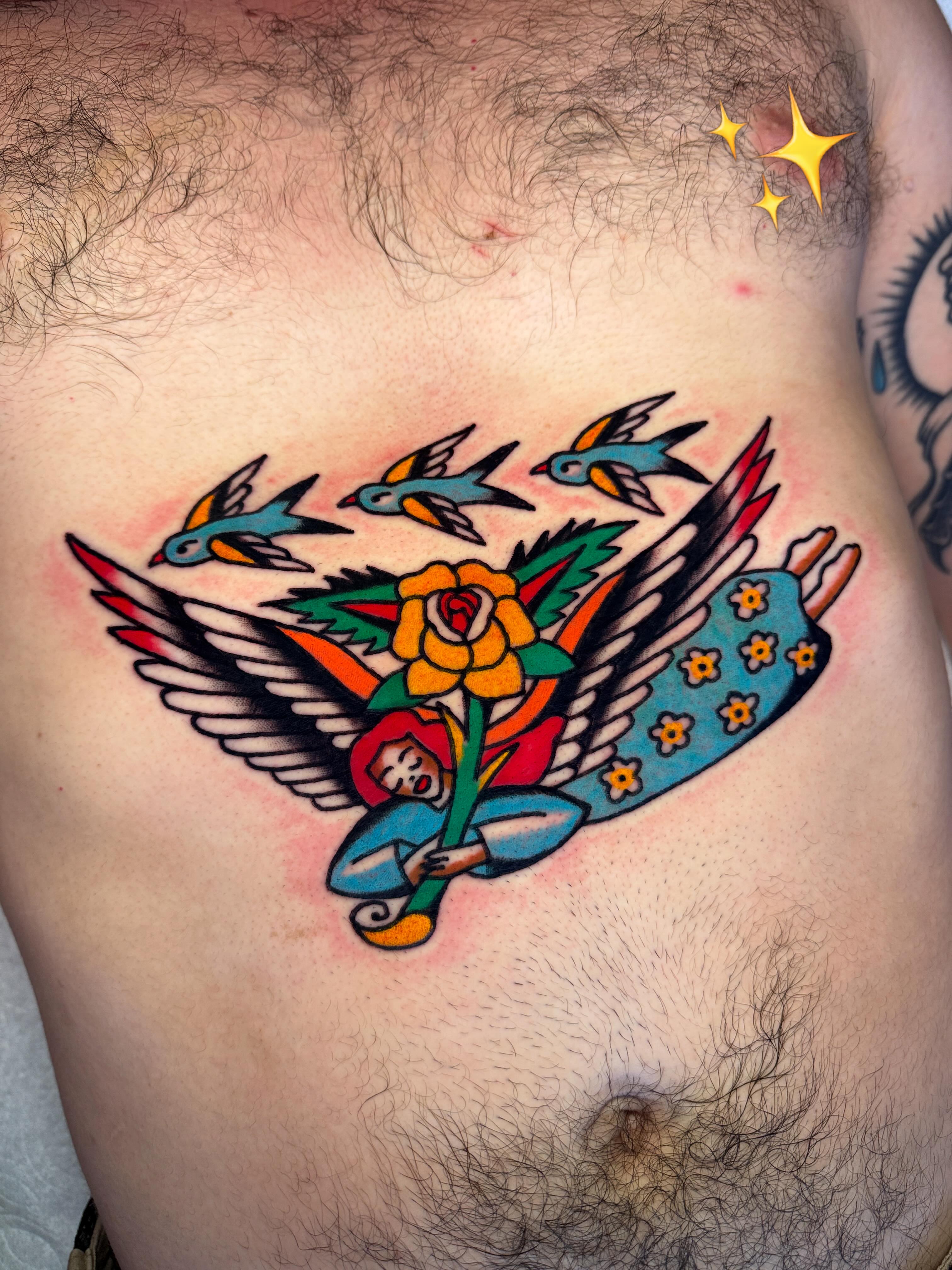 Angel with rose American traditional tattoo on the chest by Britt Kuechenmeister, Culver City, California