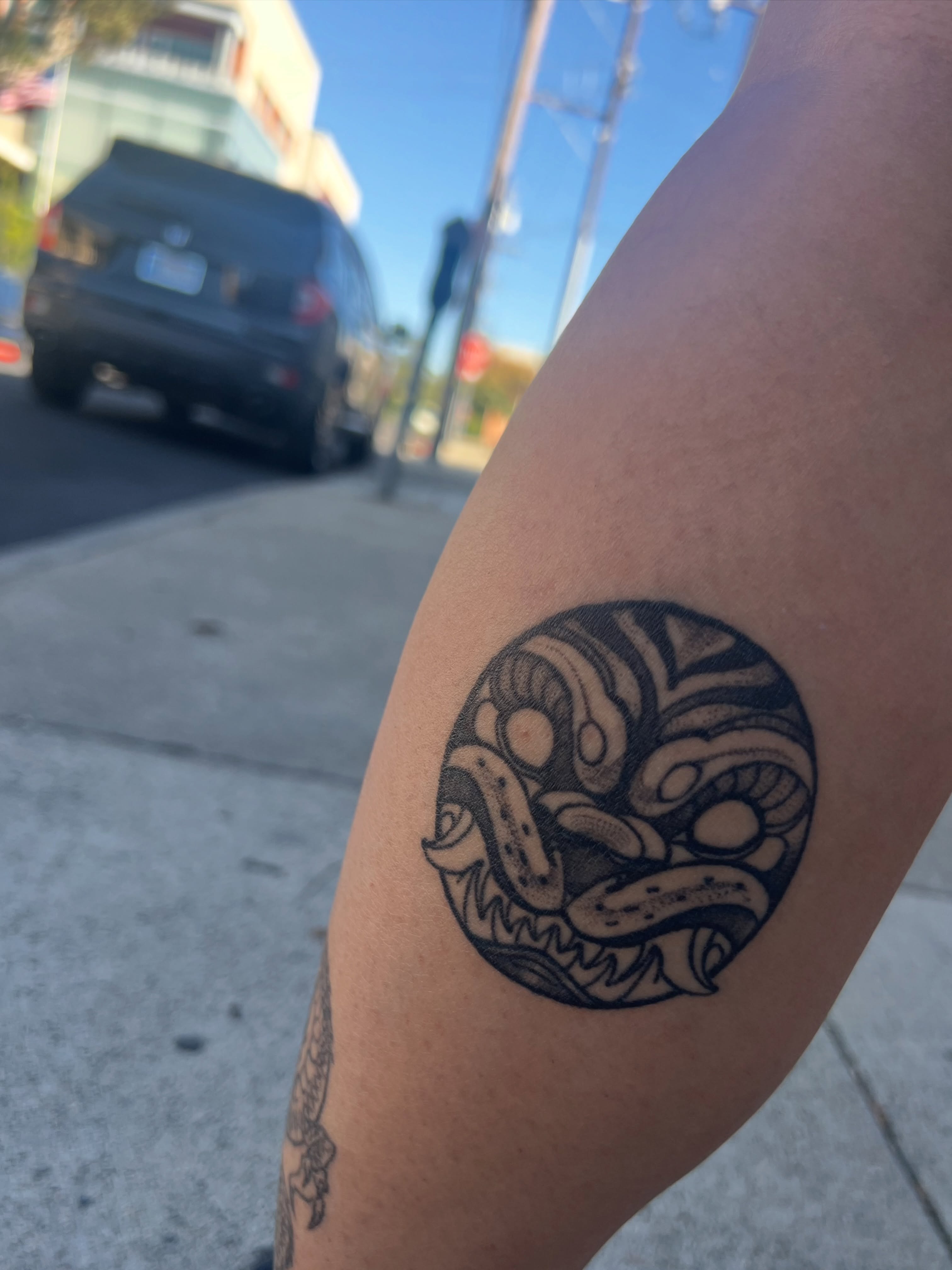 Abstract face black and grey tattoo on the forearm by Owen Smith -OEOS- SF