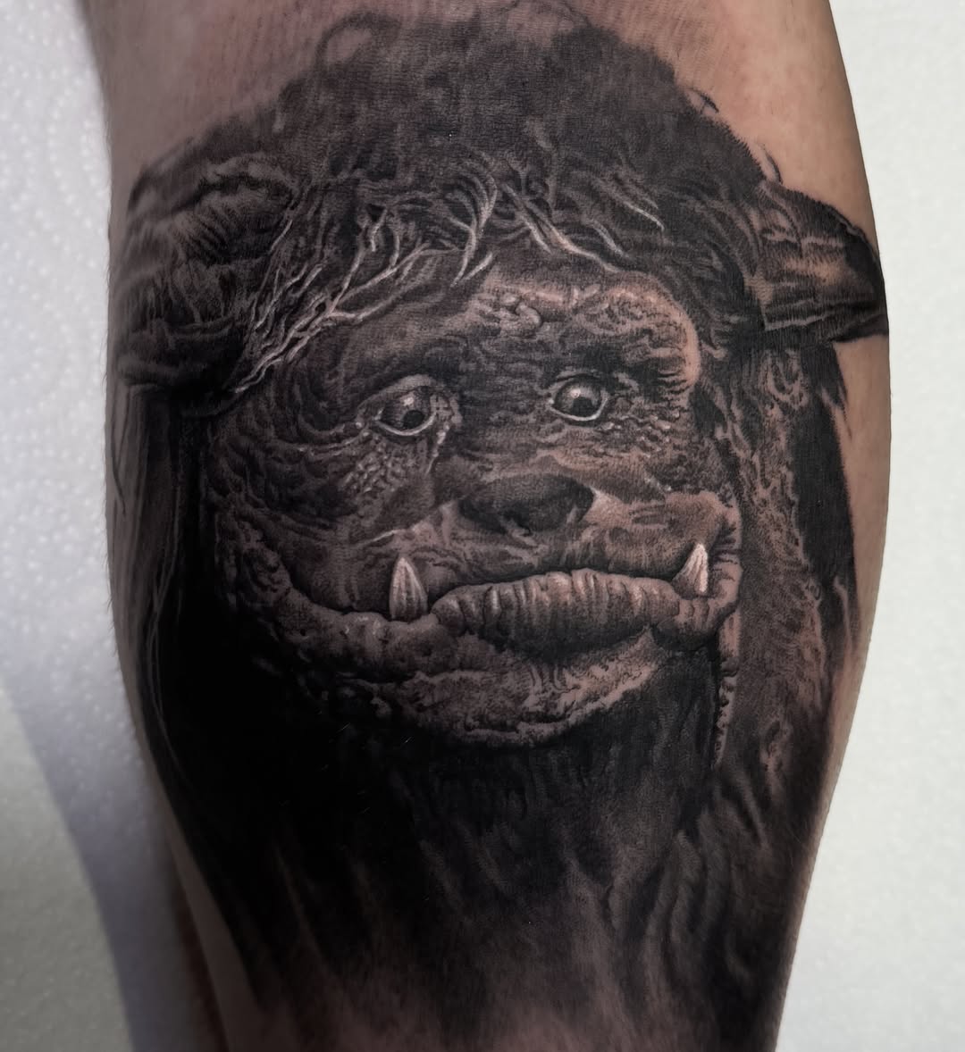Tattoo by @rikkileetattoo — realism, black_and_grey