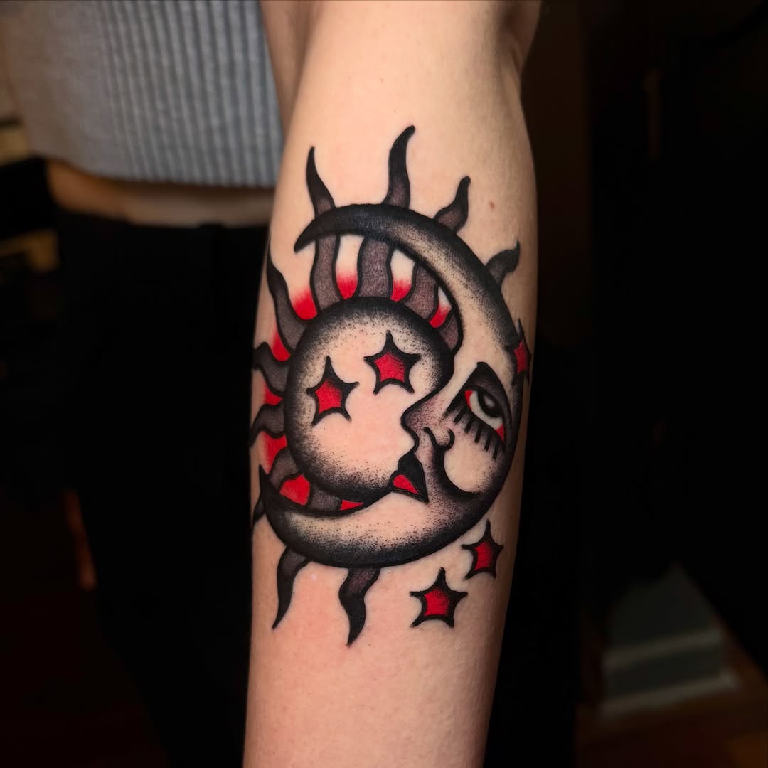 Sun and moon American traditional tattoo on the forearm by Julia Louise