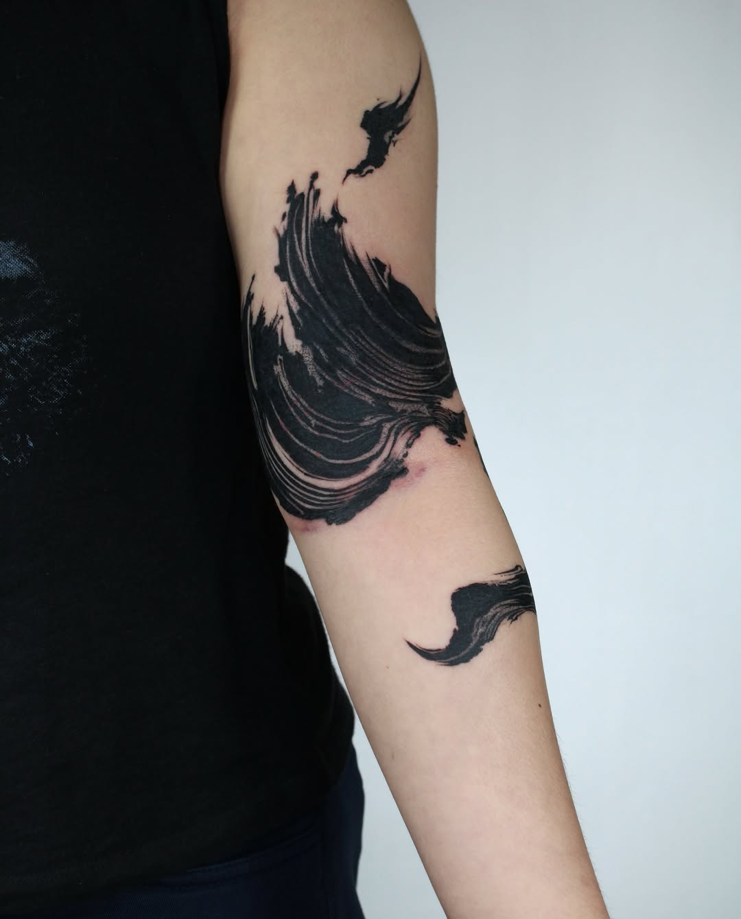 Abstract brush strokes sketch tattoo on the forearm by Piao