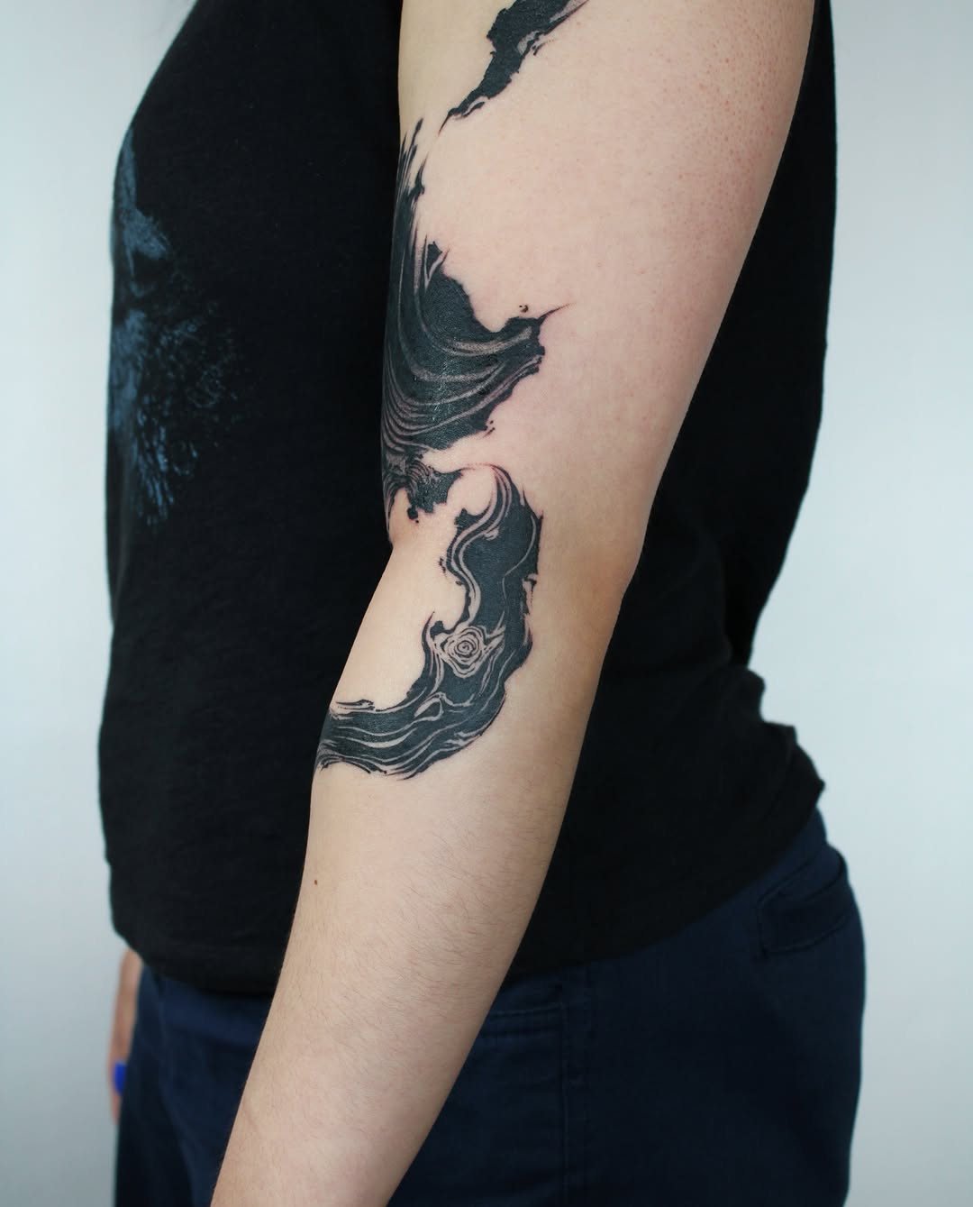 Abstract black ink sketch tattoo on the forearm by Piao