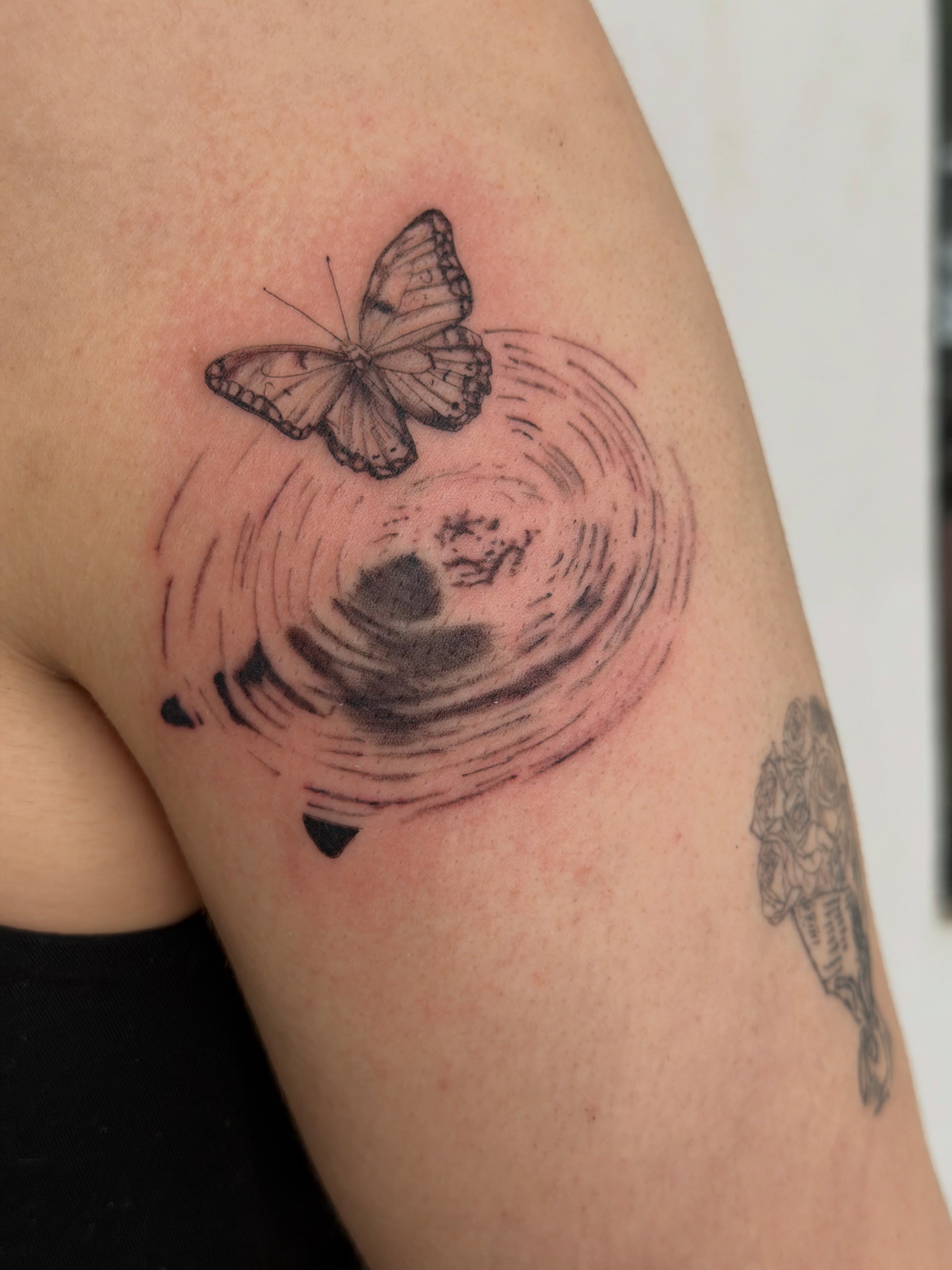 Butterfly and ripples realism tattoo on the forearm by Jacksyn, Plano, Texas