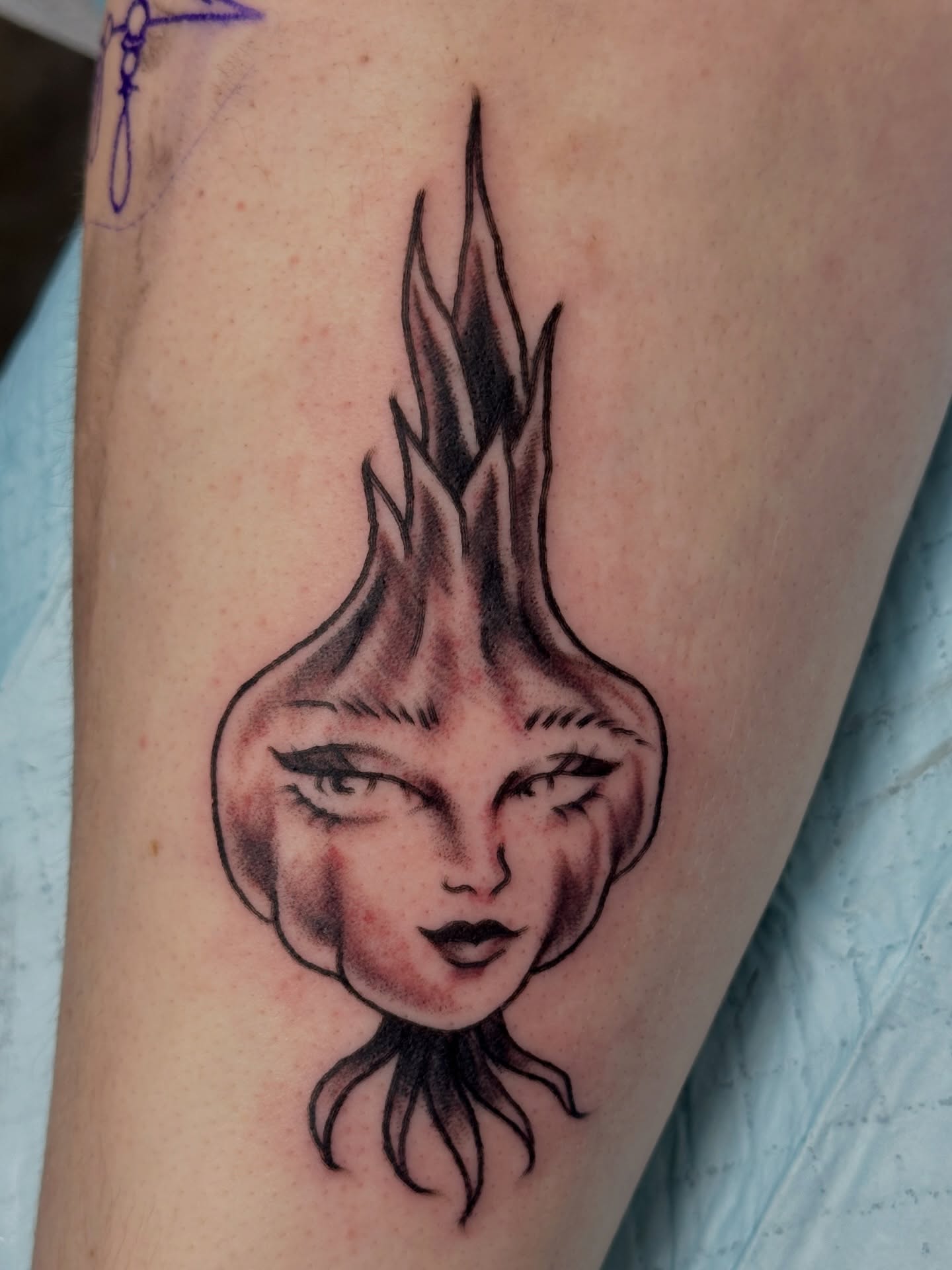 Flame-headed woman black and grey tattoo on the forearm by julian solis, Houston, Texas