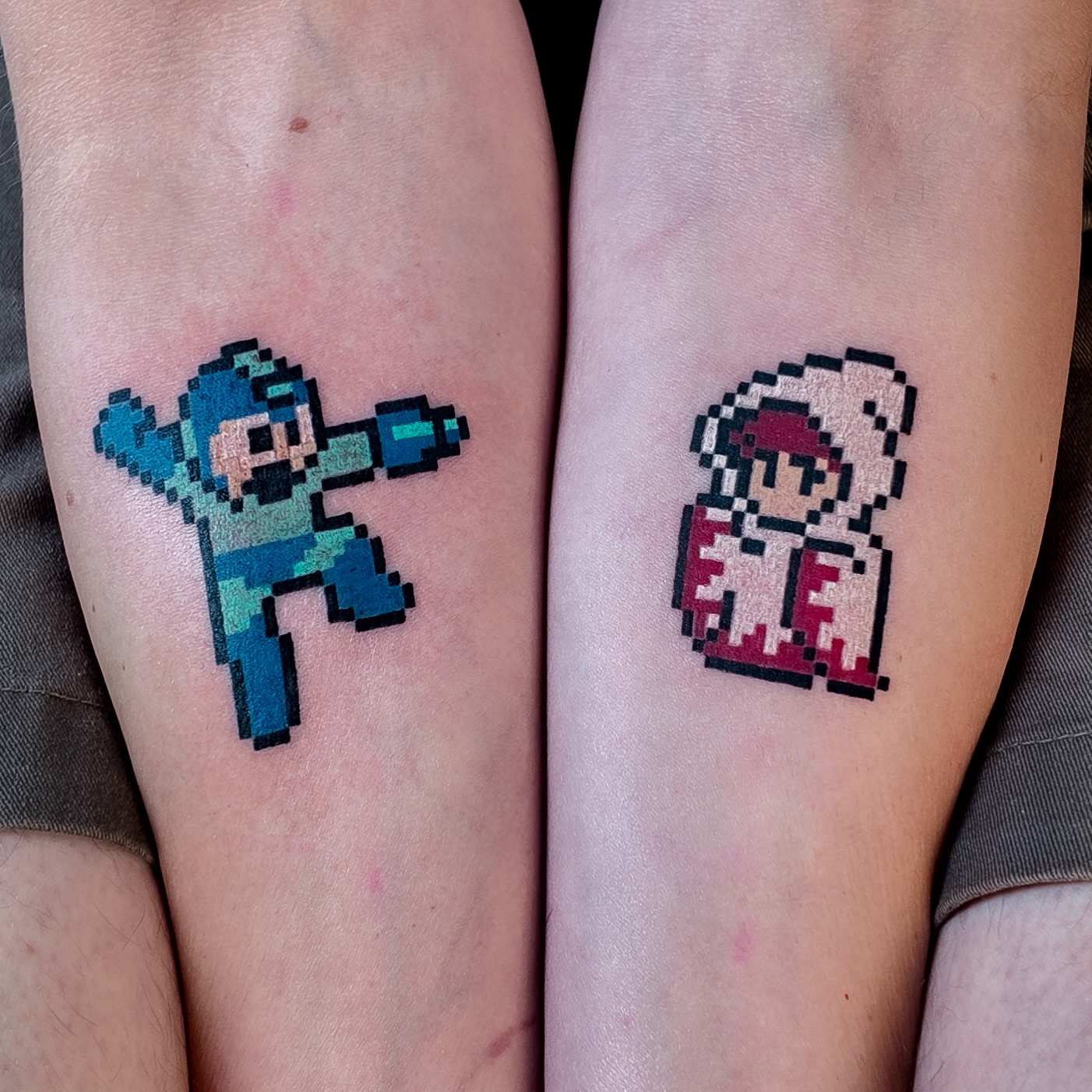 Pixel art characters dotwork tattoo on the forearm by m r p i x e l ๐ธ๐ฌ