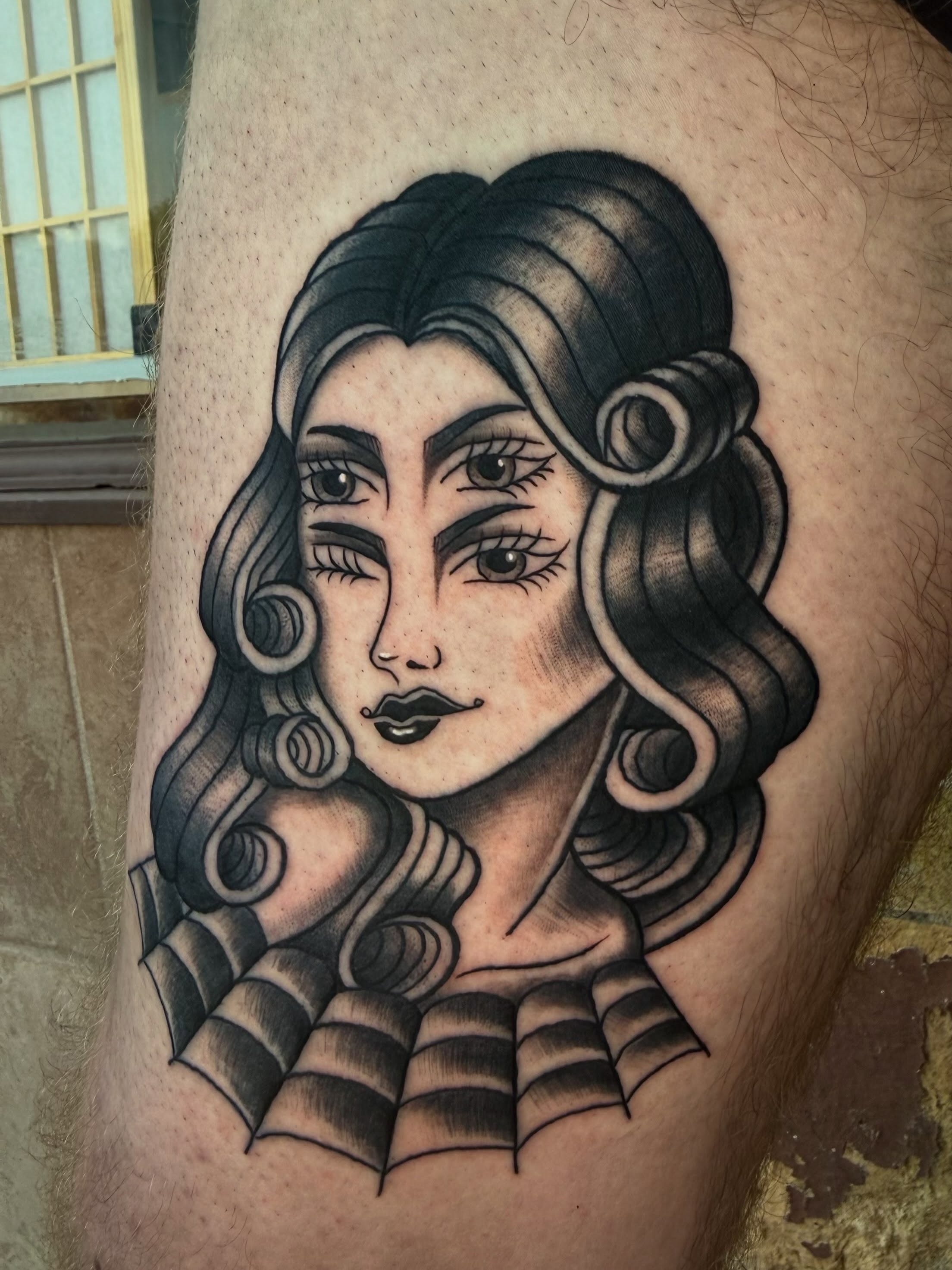 Woman with intricate hair realism tattoo on the thigh by Austin Poliszuk, Minneapolis, Minnesota