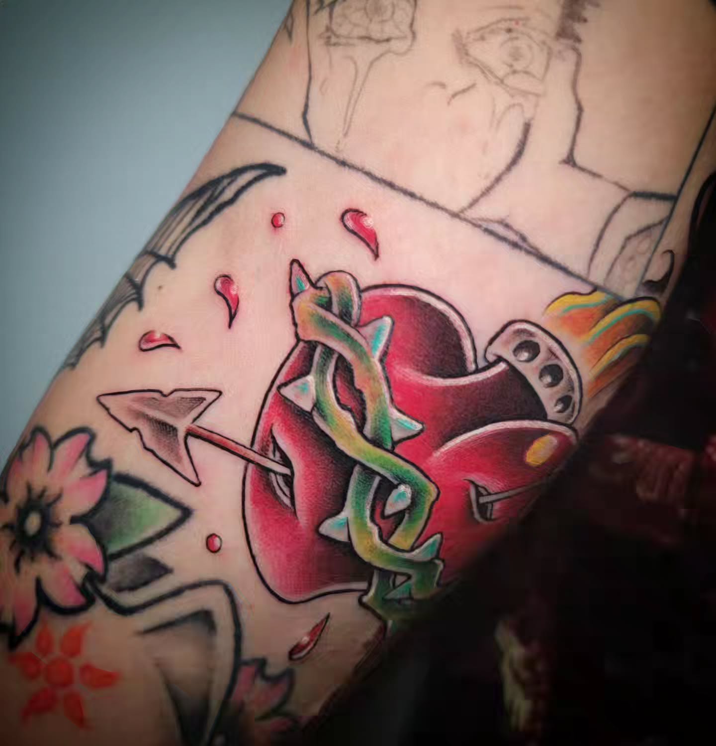 Apple with snake American traditional tattoo on the forearm by Randyz Tattyz