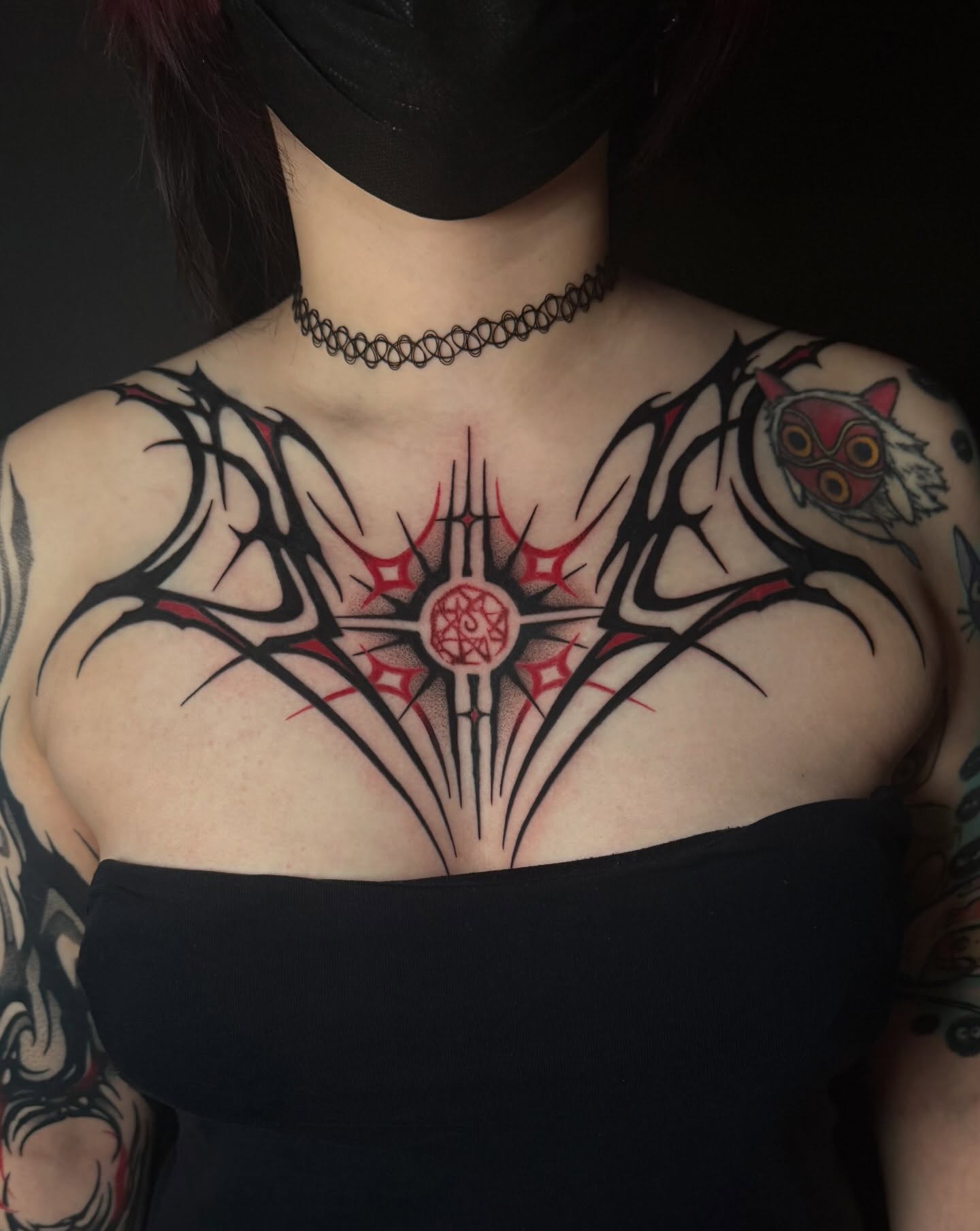 Geometric cross geometric tattoo on the chest by Dylan Orbock, Berkeley, California