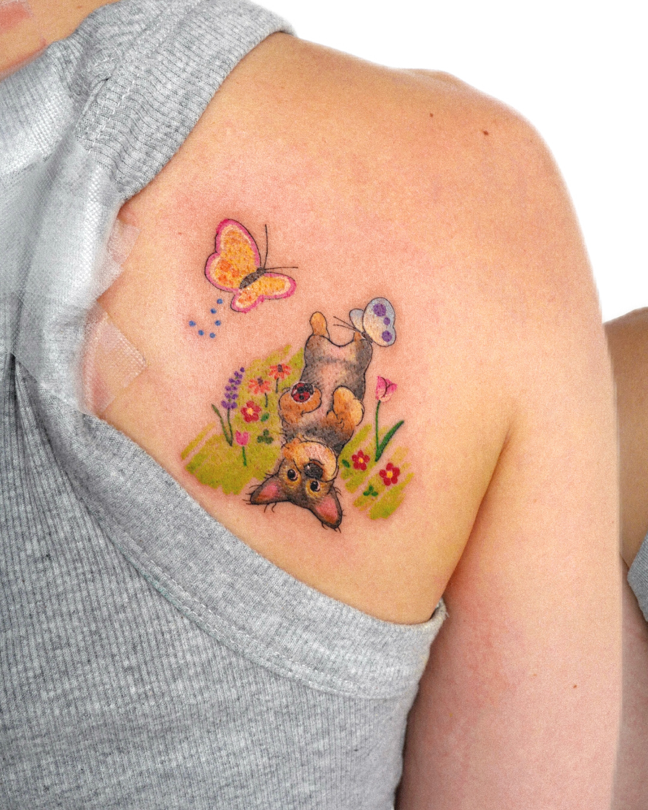 Mouse and butterfly dotwork tattoo on the shoulder by dahye lee