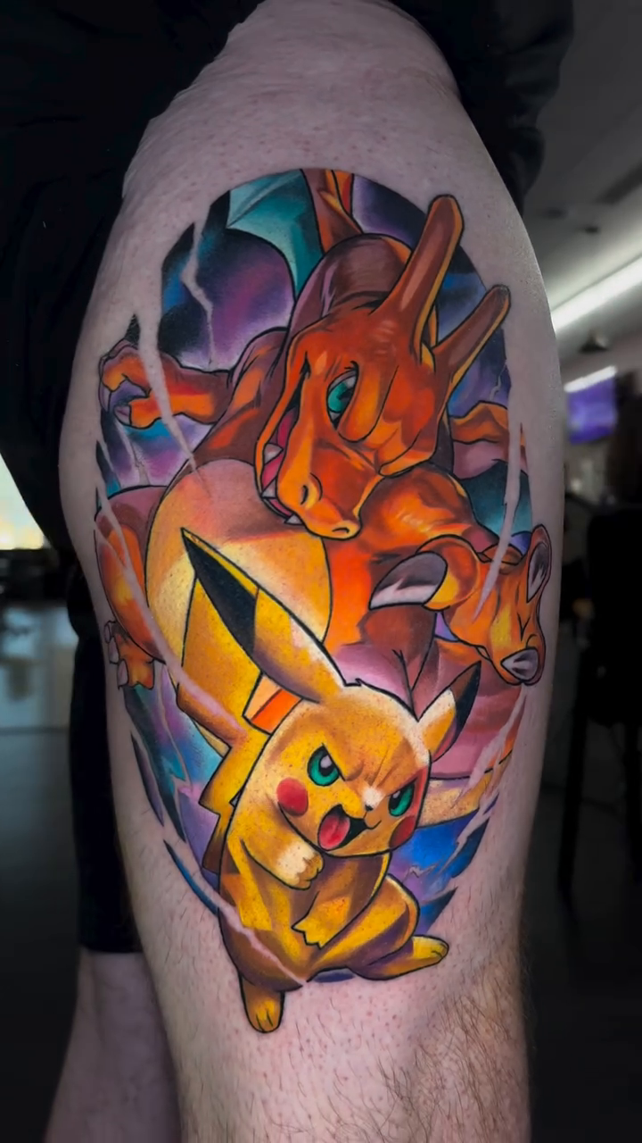 Pikachu and Charizard anime tattoo by Dustin Kaiser, Mentor, Ohio
