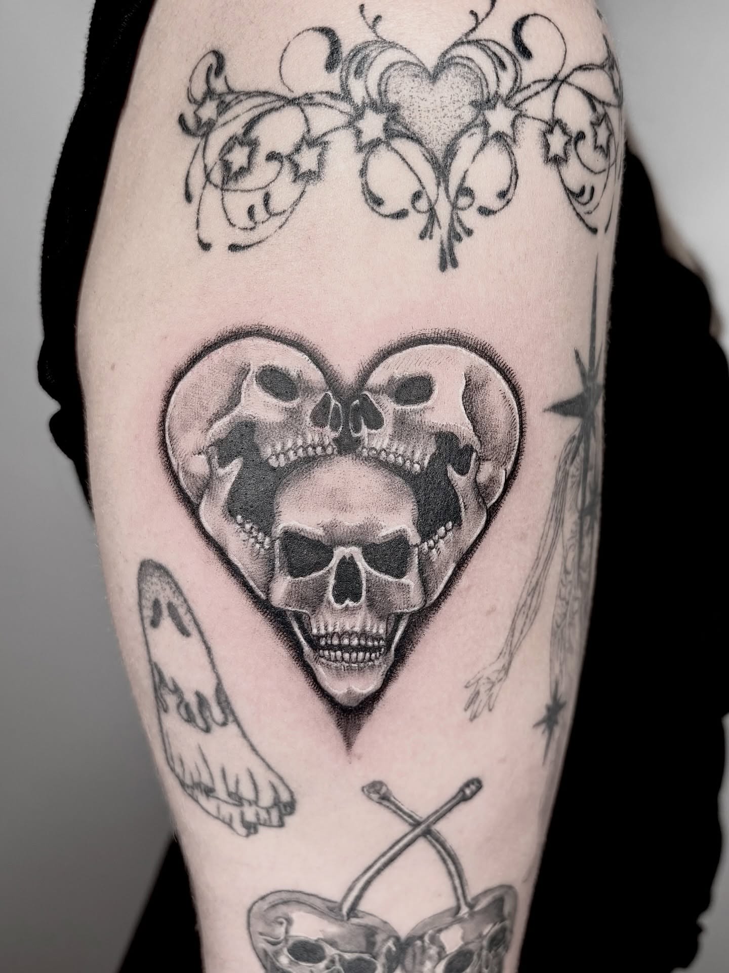 Skulls in heart realism tattoo on the forearm by <3 eve’s tattoos <3