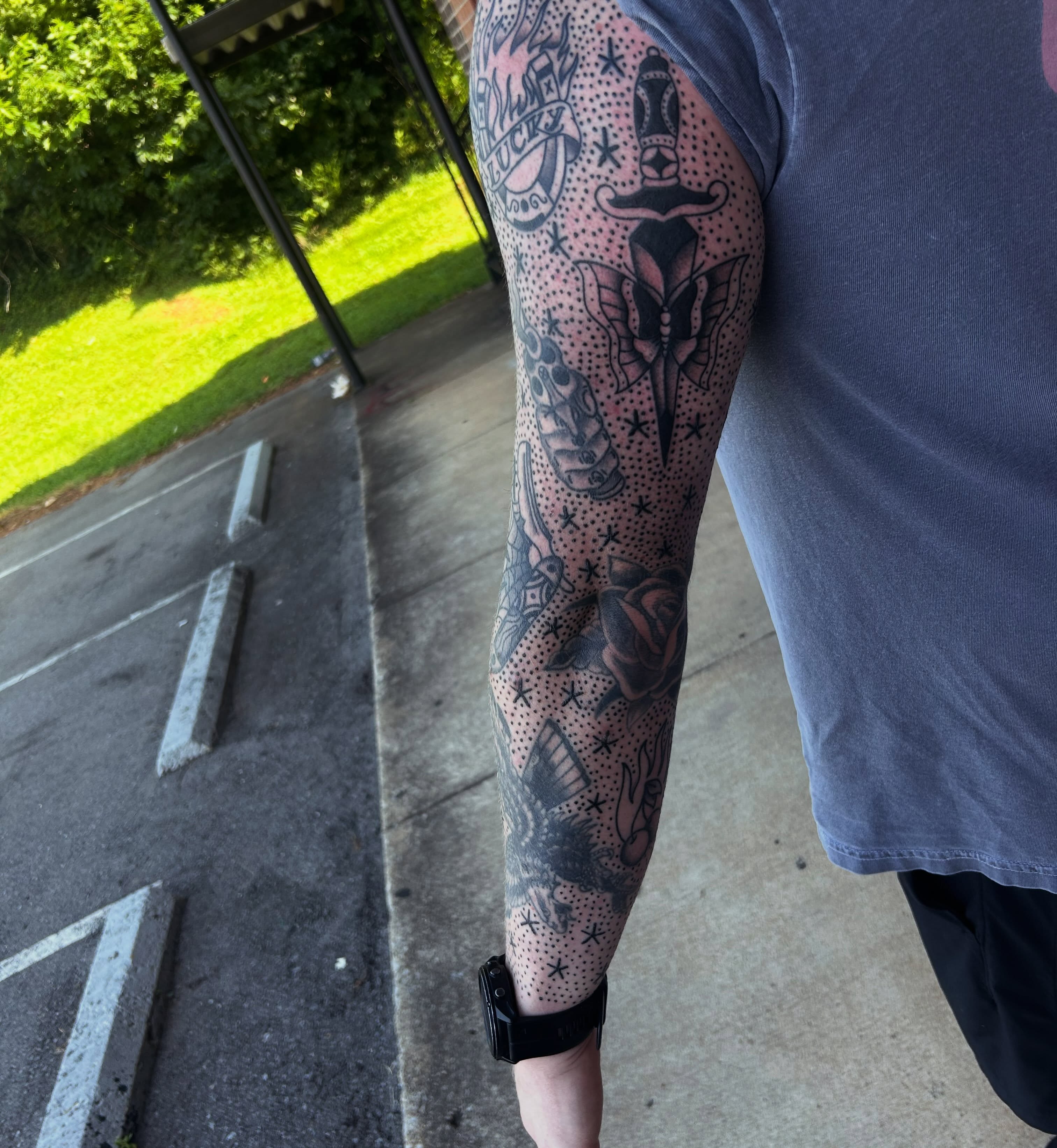 Full sleeve tattoo dotwork tattoo on the forearm by Zach Andrews