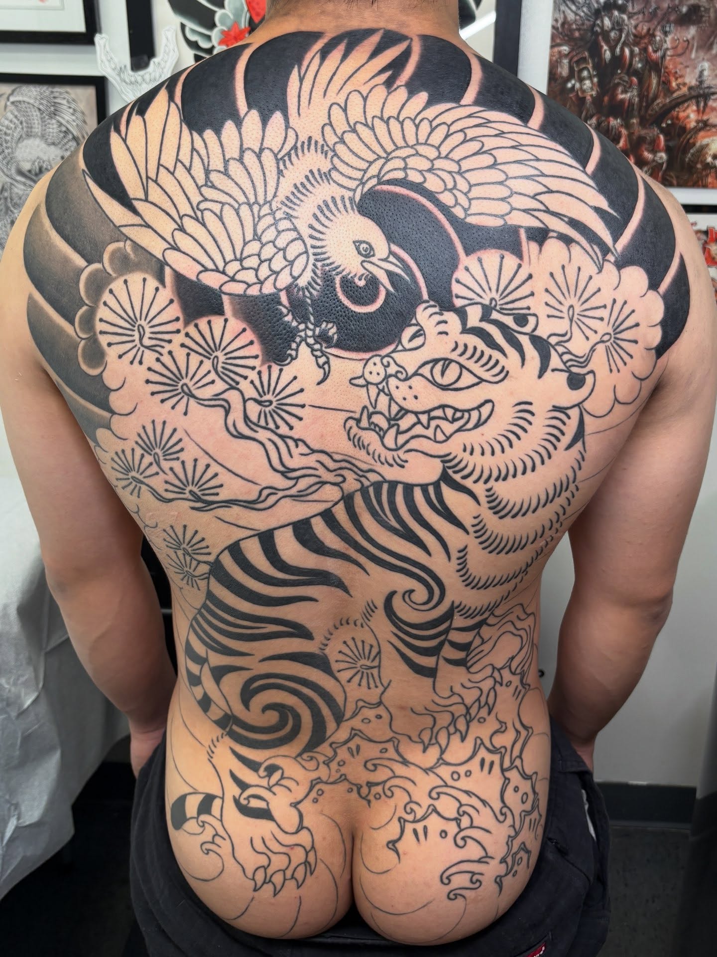 Tiger and phoenix japanese irezumi tattoo on the back by Jamie Yuu, Minneapolis, Minnesota