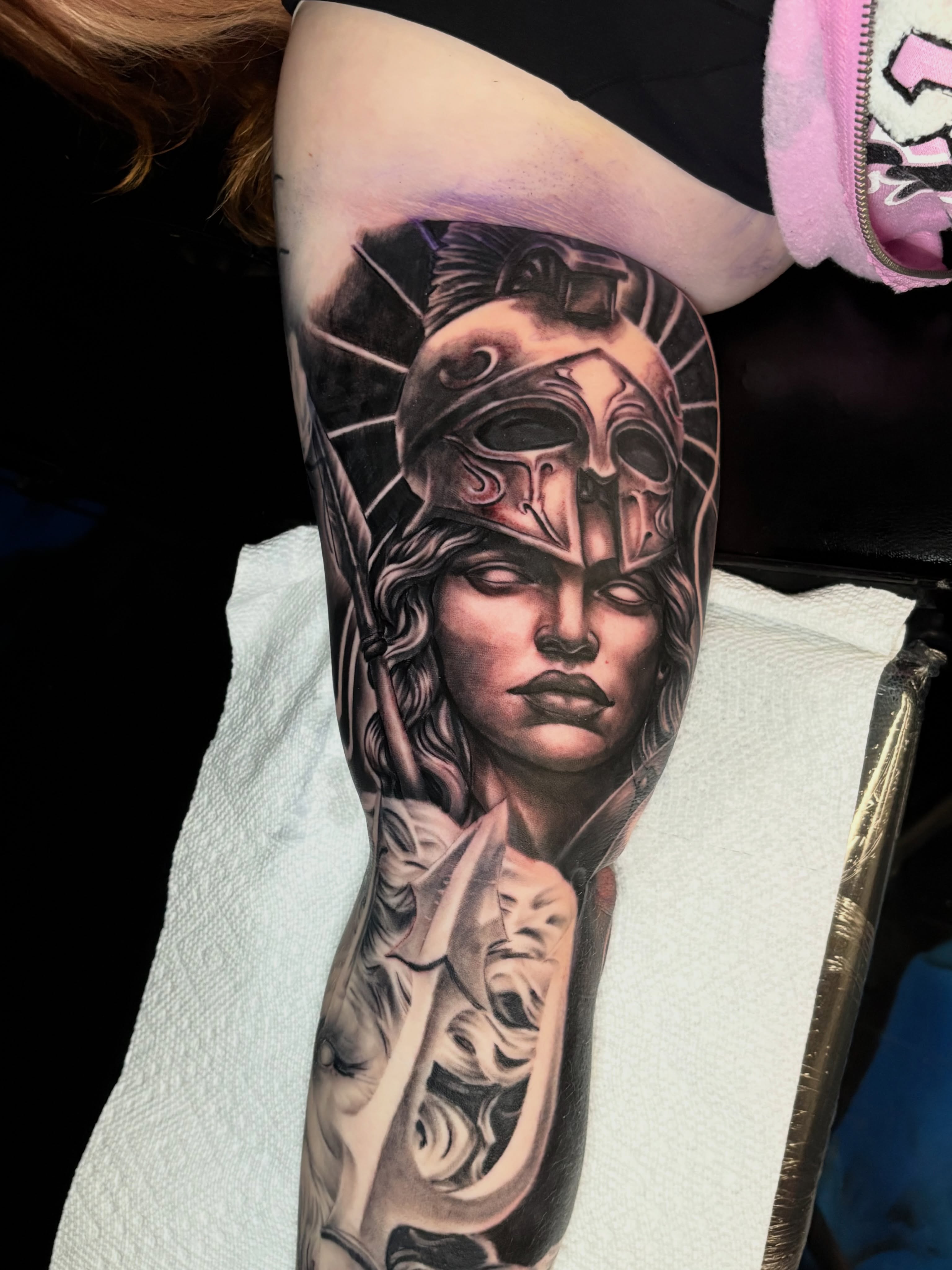 Woman with helmet realism tattoo on the forearm by Vonte Seay