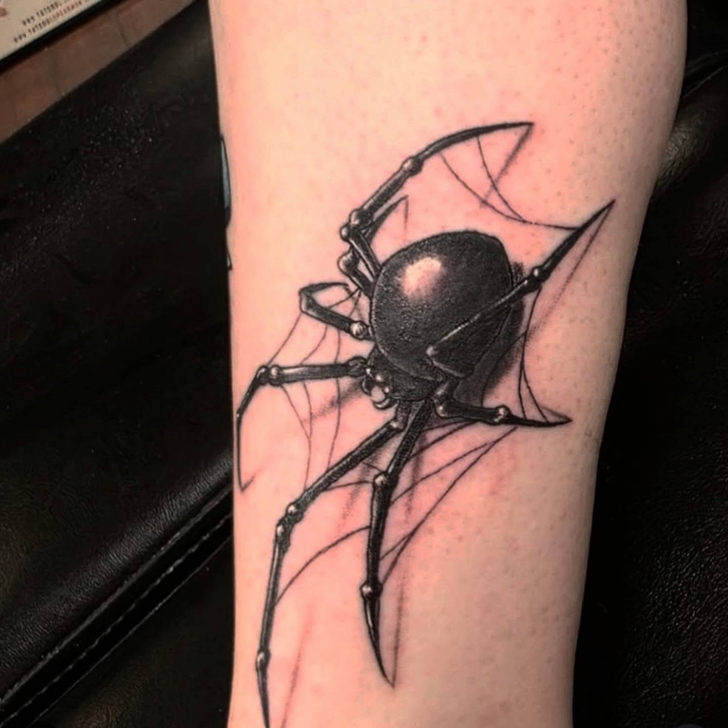 Spider realism tattoo on the forearm by Jeff Frederick