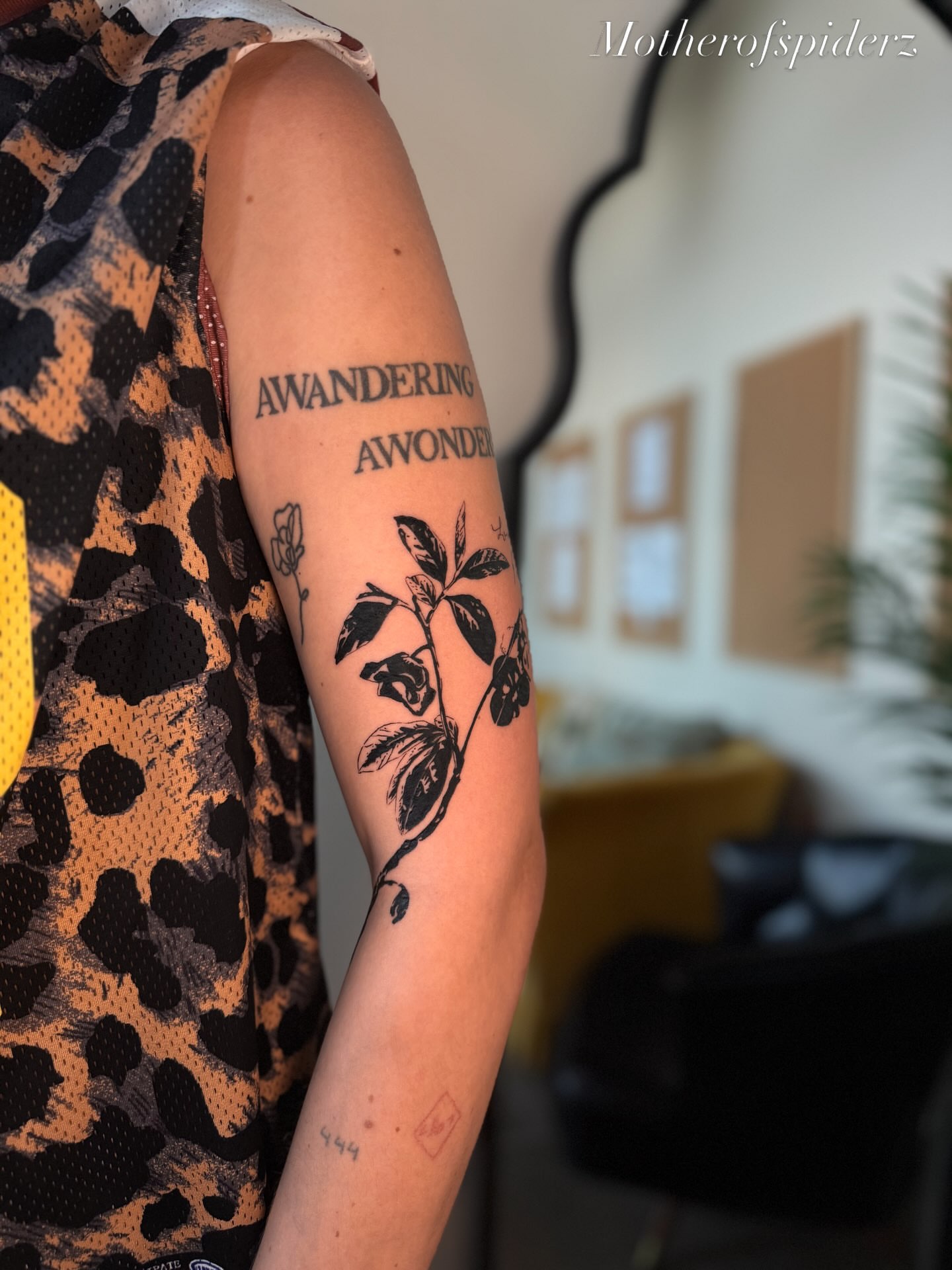 Botanical black and grey tattoo on the forearm by Alyssa Garza