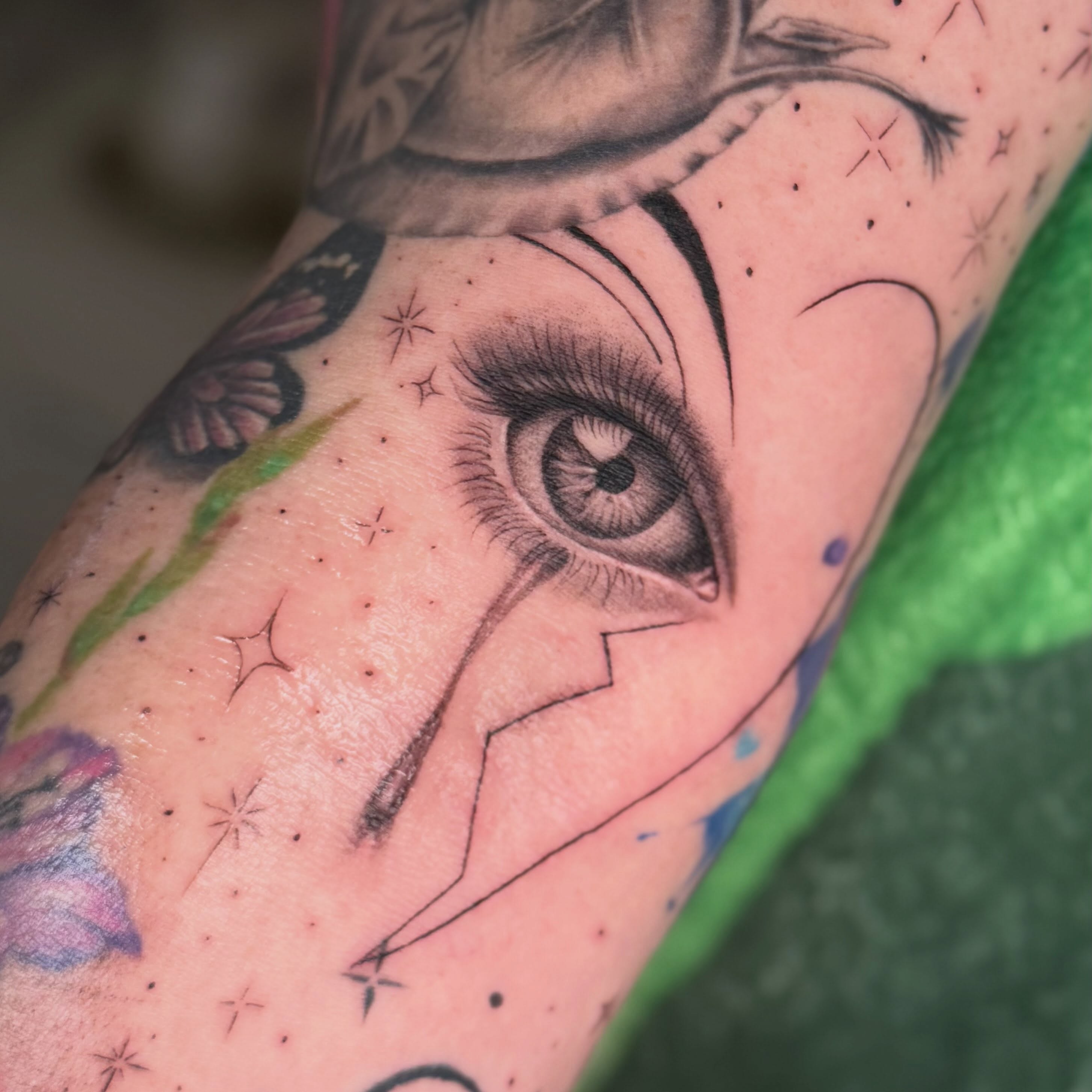Eye realism tattoo on the forearm by Faith Lopez