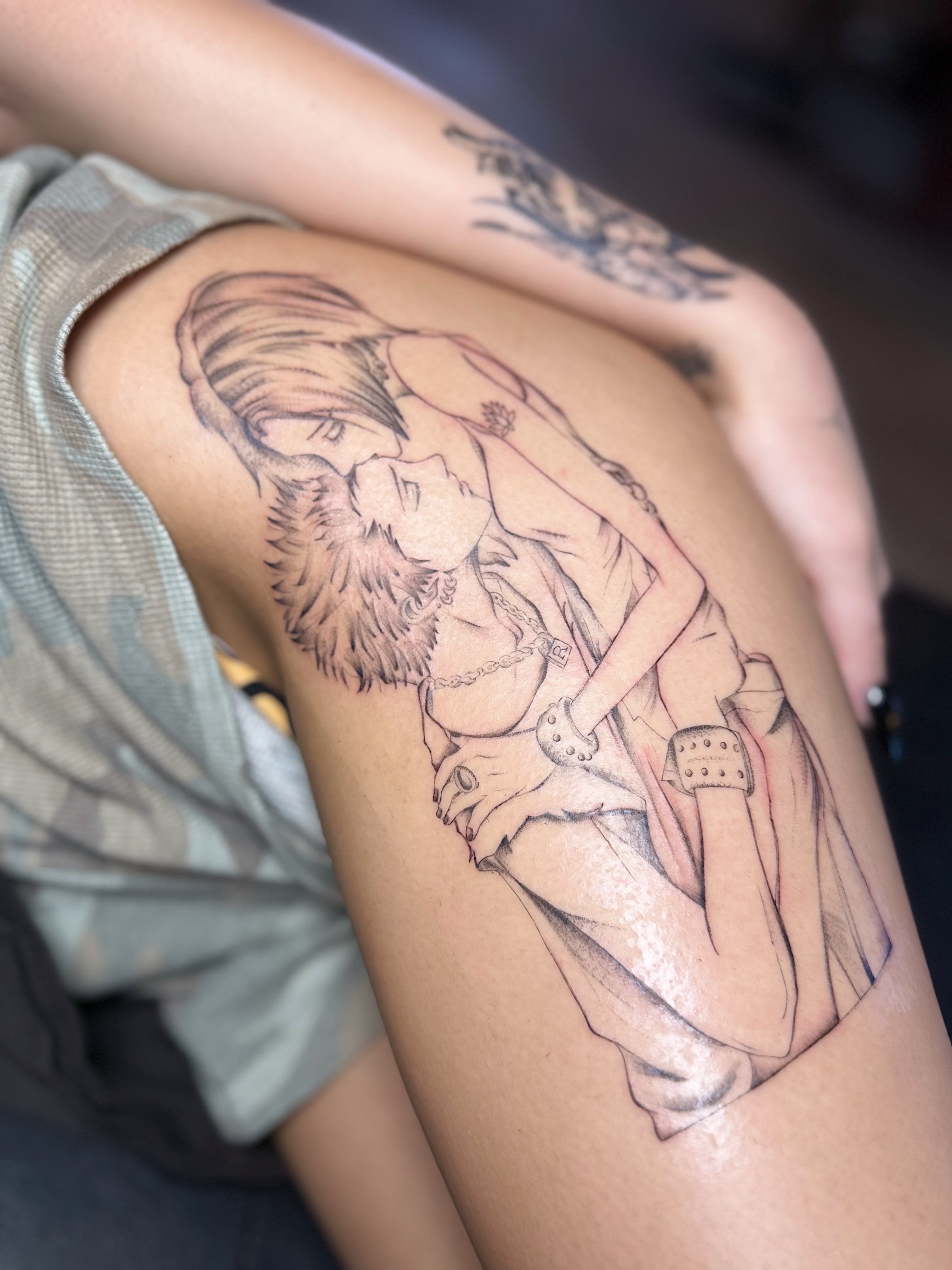 Couple kissing realism tattoo on the thigh by INK with Christian, Mineral Wells, Texas