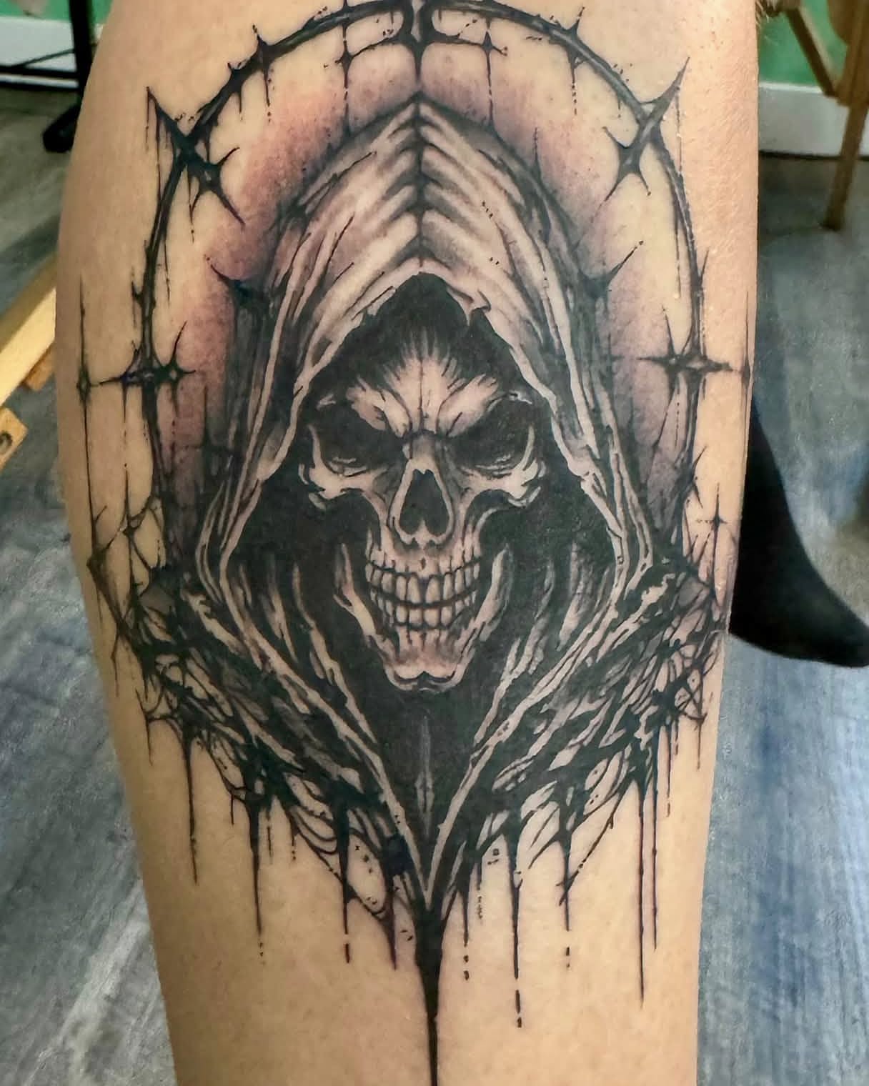 Grim reaper dark realism tattoo on the thigh by Skott Kautman, Dubuque, Iowa