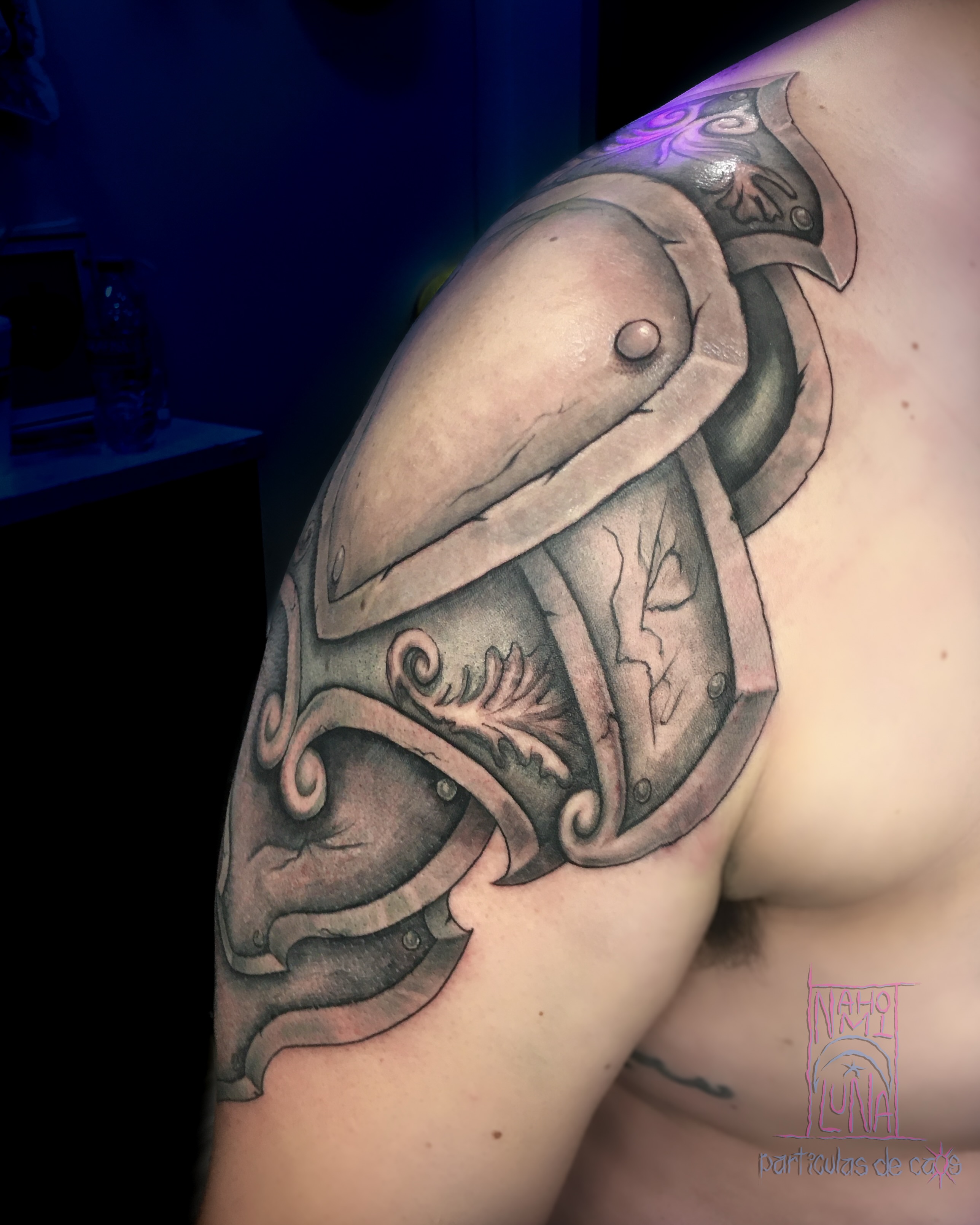 Helmet realism tattoo on the shoulder by Nahomi Luna - Memphis & Cordova Tattoo, Memphis, Tennessee